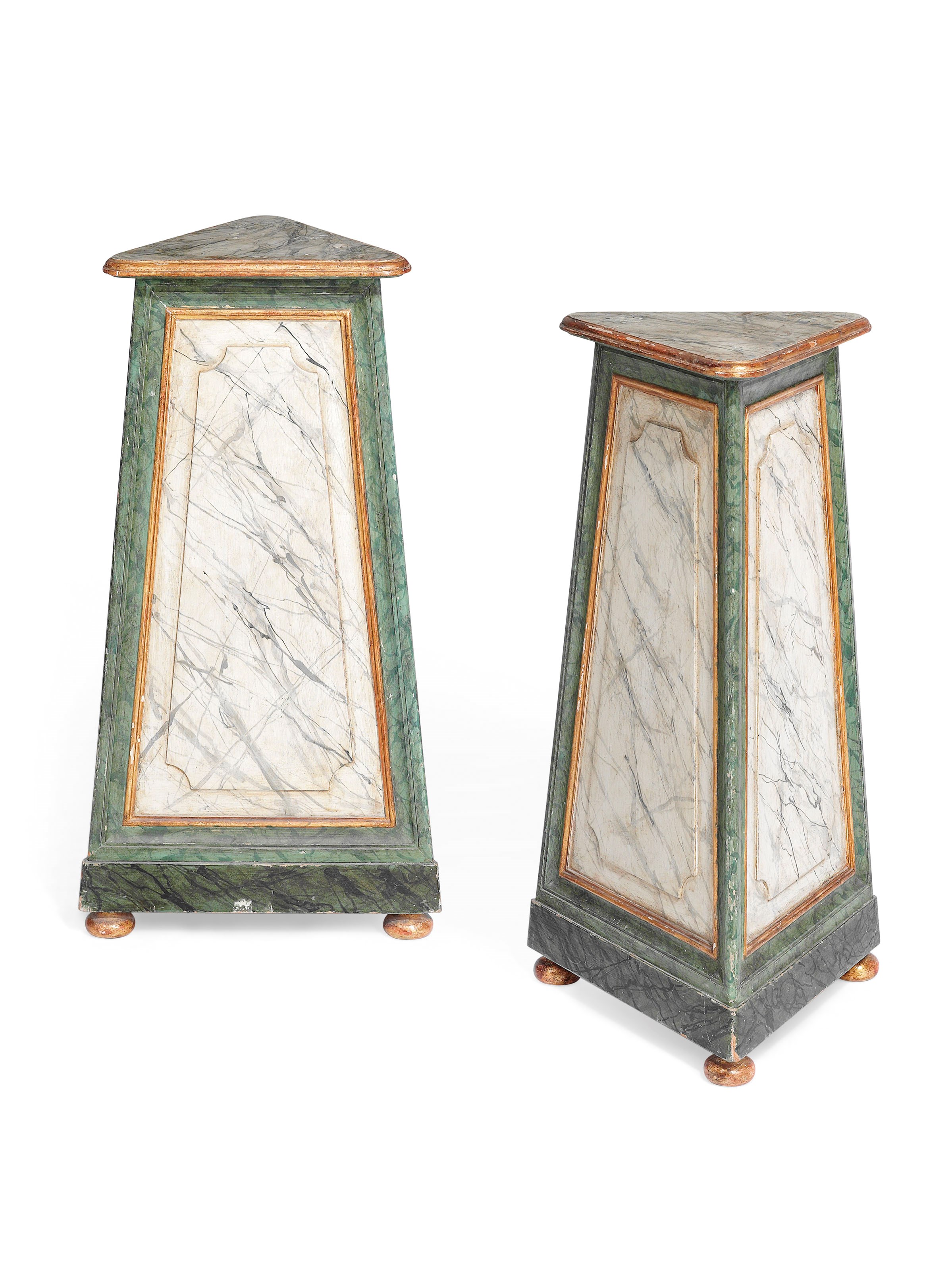 A PAIR OF SIMULATED MARBLE AND PARCEL GILT TRIFORM PEDESTALS