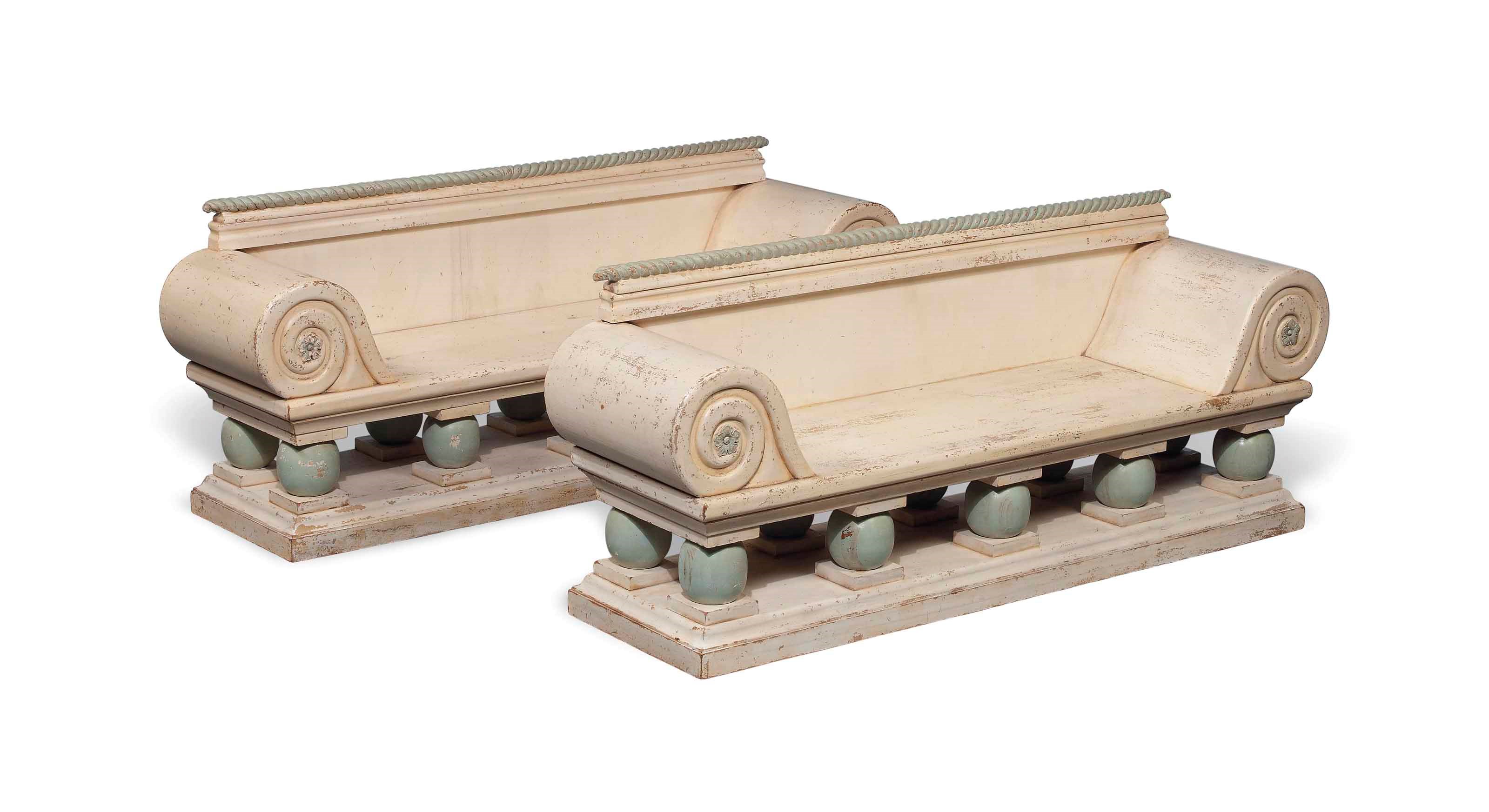 A PAIR OF CARVED AND PAINTED WOOD CHILDREN'S GARDEN SEATS