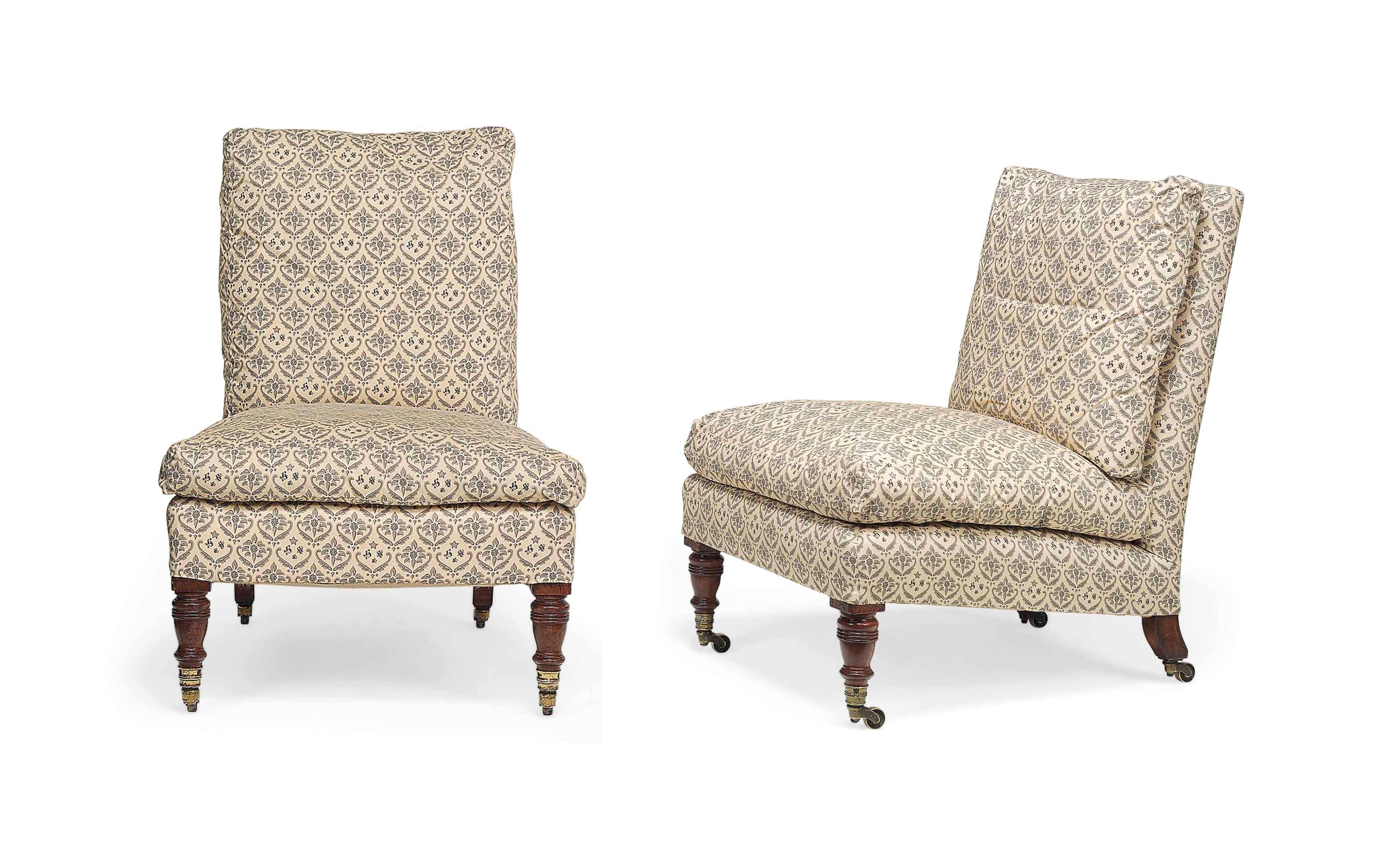 A PAIR OF LATE VICTORIAN WALNUT SLIPPER CHAIRS