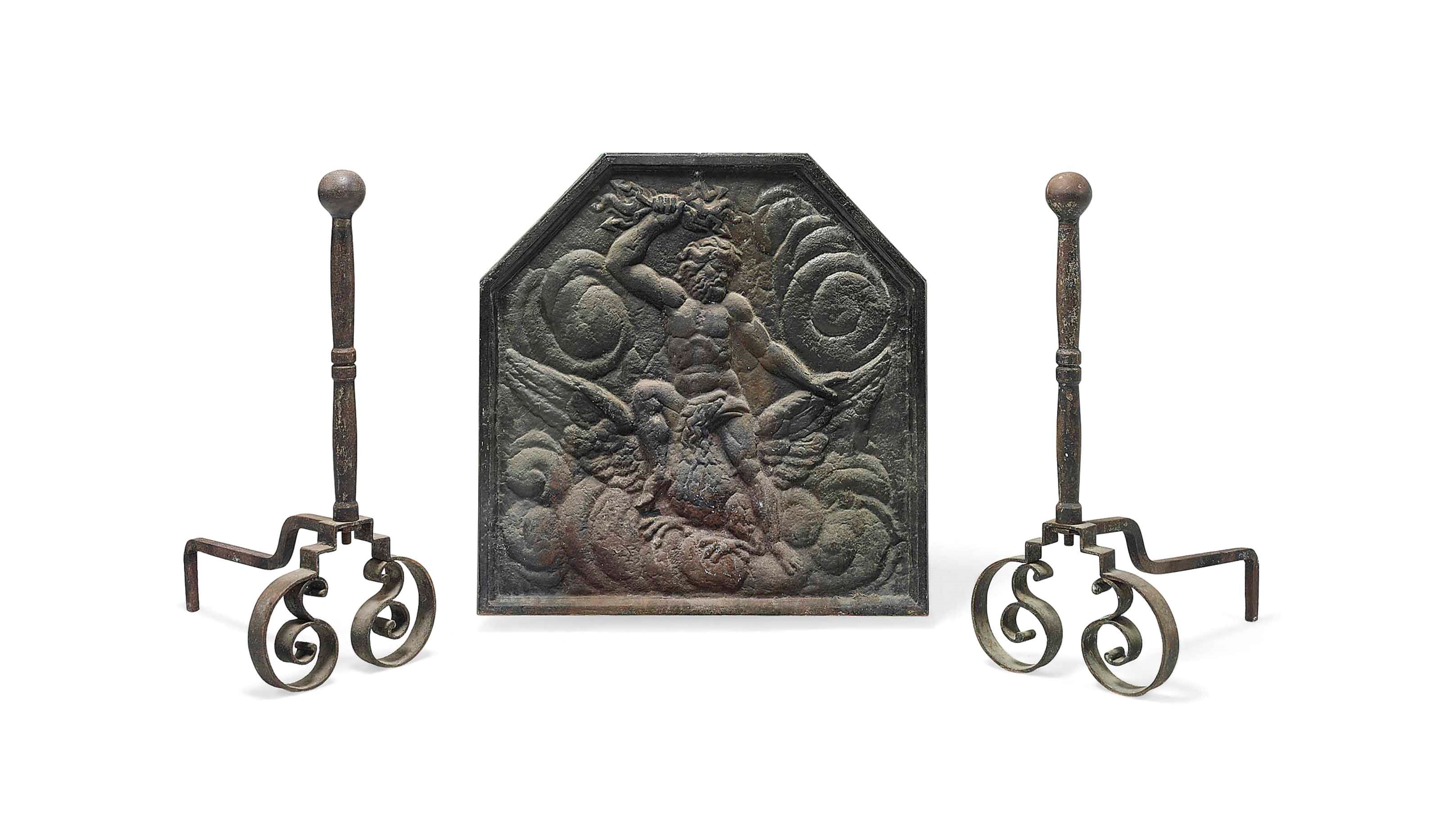 A PAIR OF CONTINENTAL WROUGHT-IRON LARGE ANDIRONS
