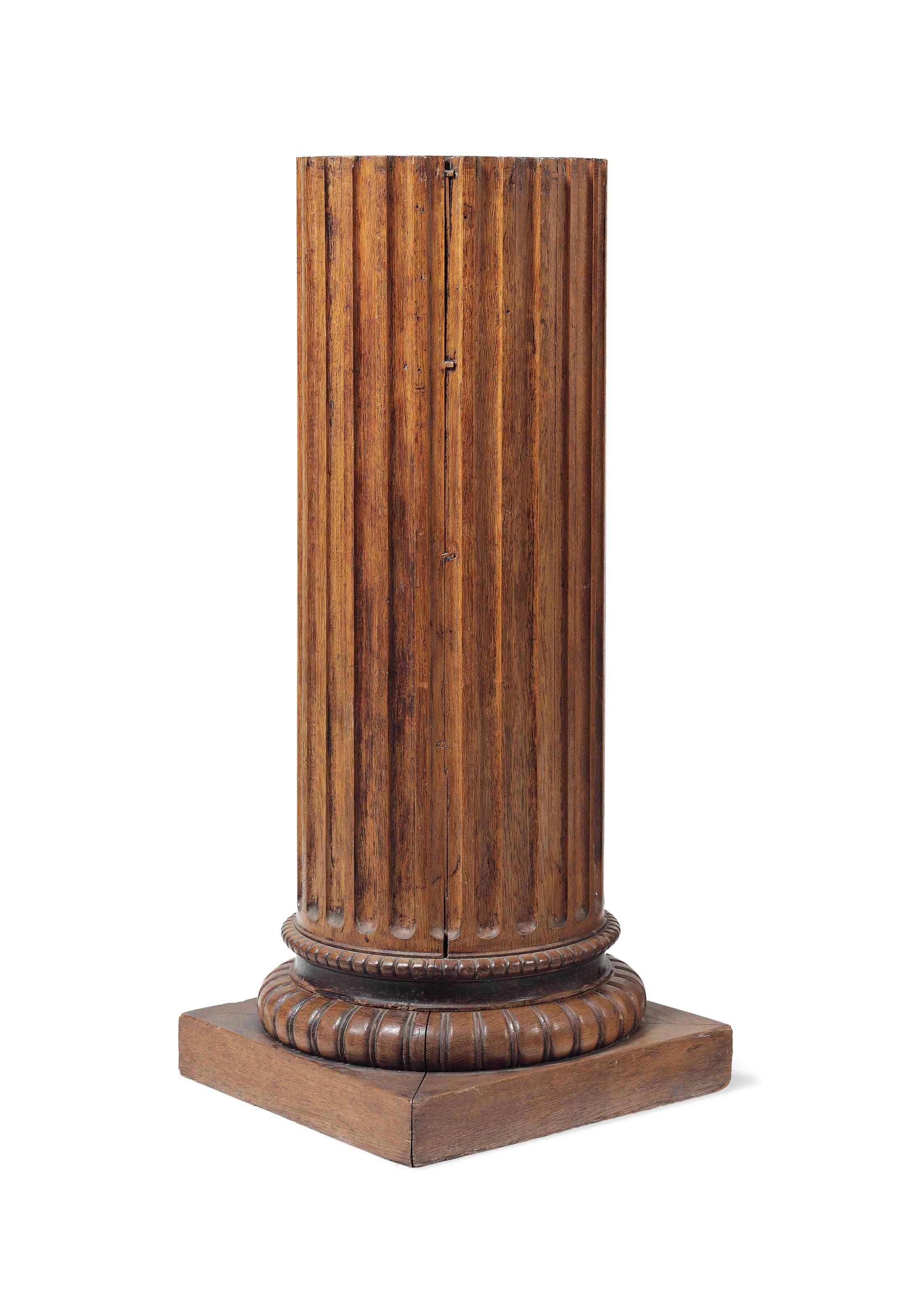 A VICTORIAN OAK FLUTED PEDESTAL