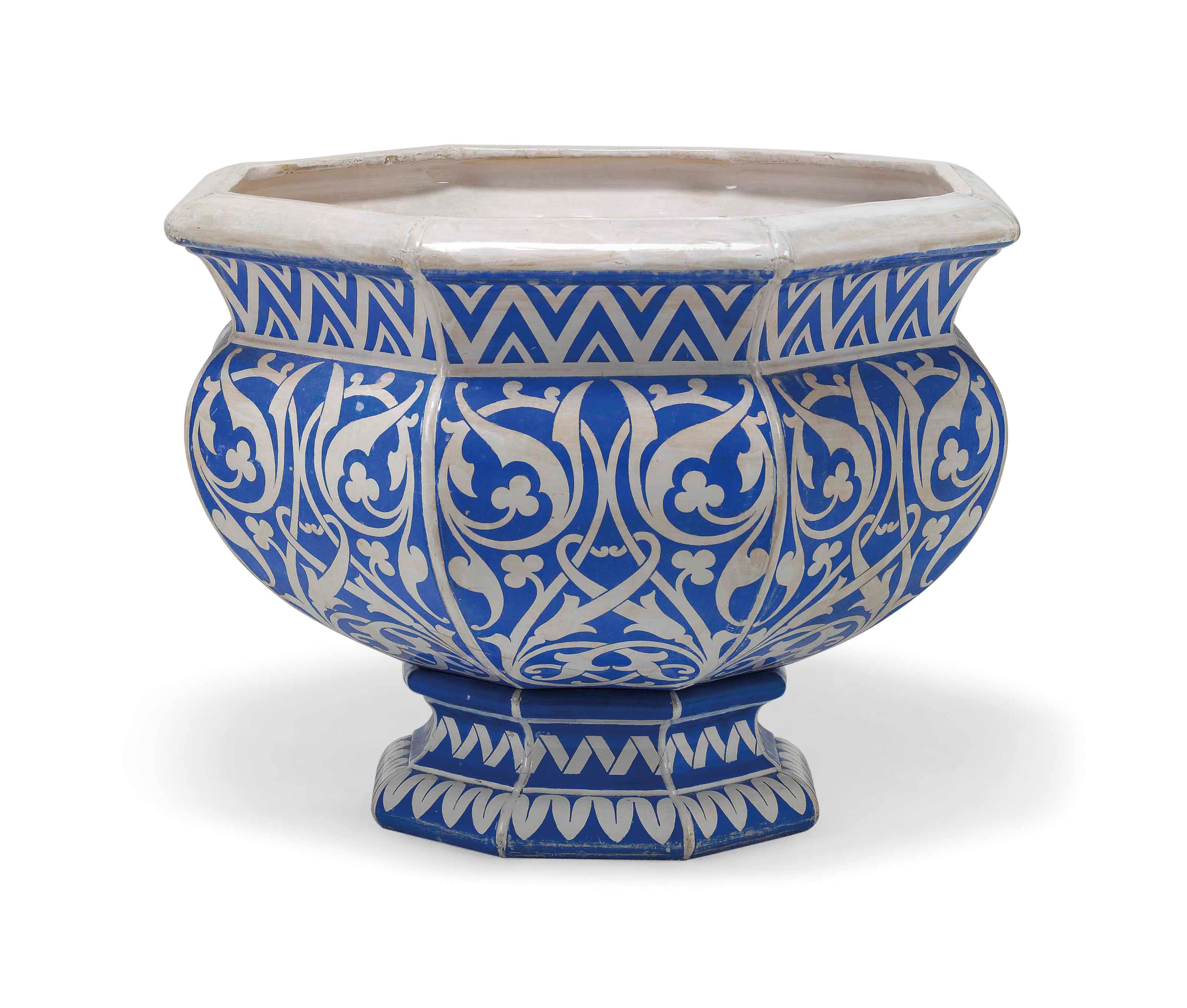 AN ENGLISH BLUE AND WHITE LARGE OCTAGONAL FOOTED JARDINIERE
