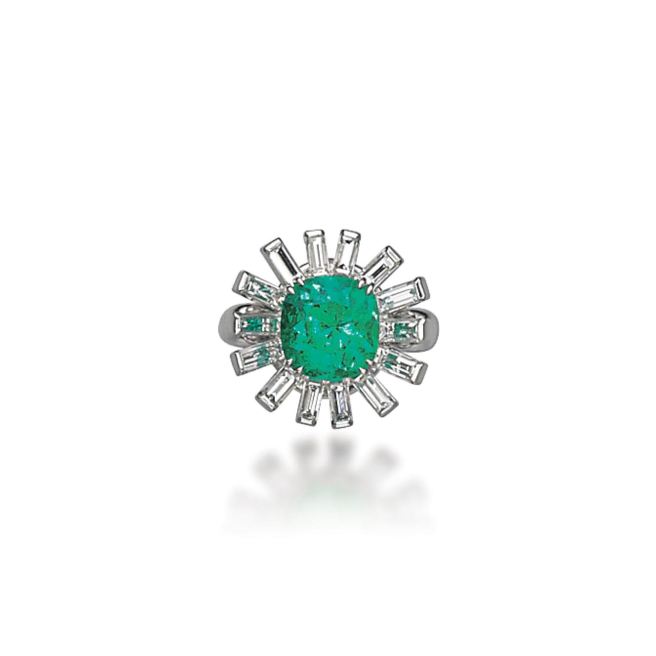 AN EMERALD AND DIAMOND RING
