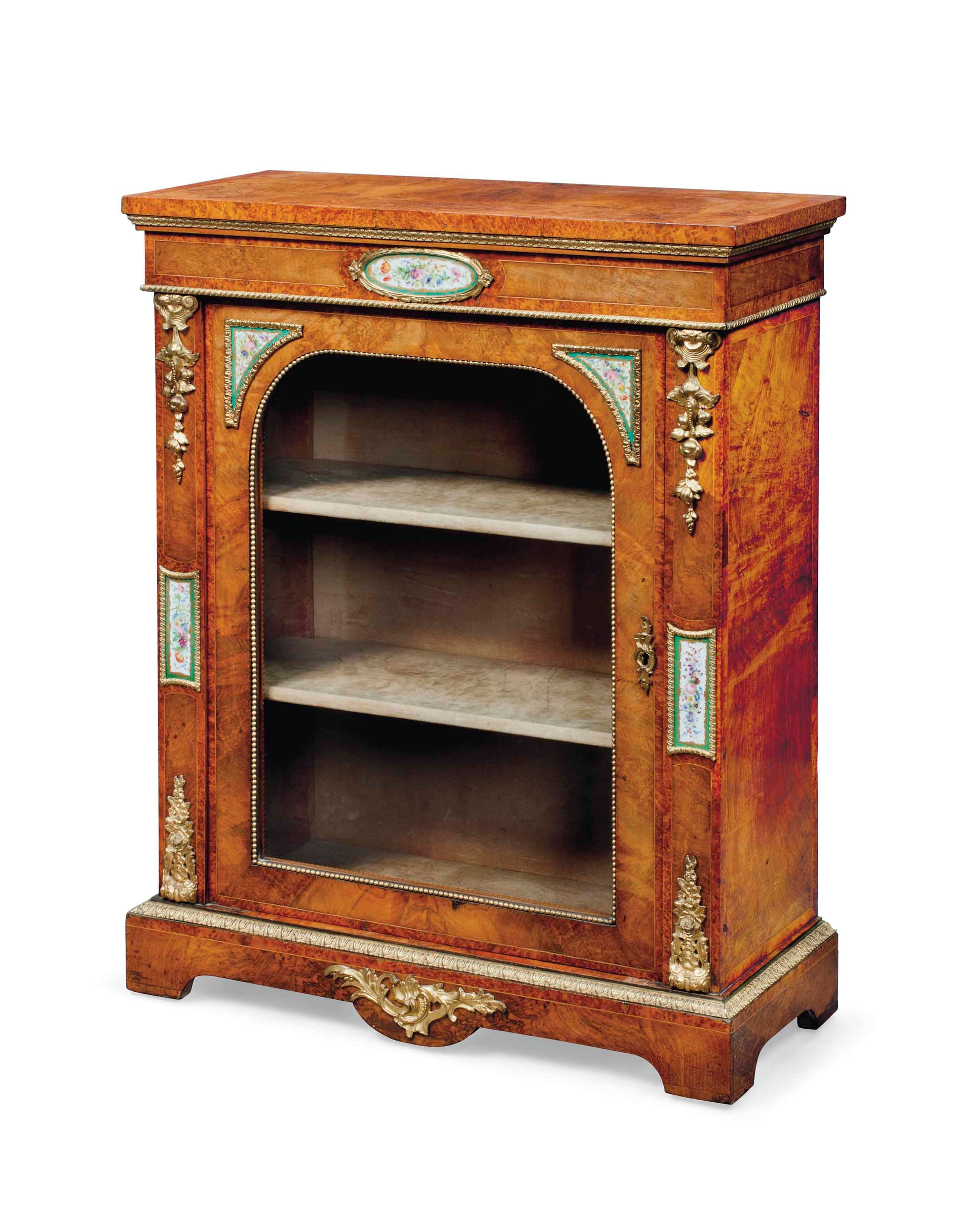 A VICTORIAN ORMOLU AND SEVRES PORCELAIN MOUNTED FIGURED WALNUT PIER-CABINET