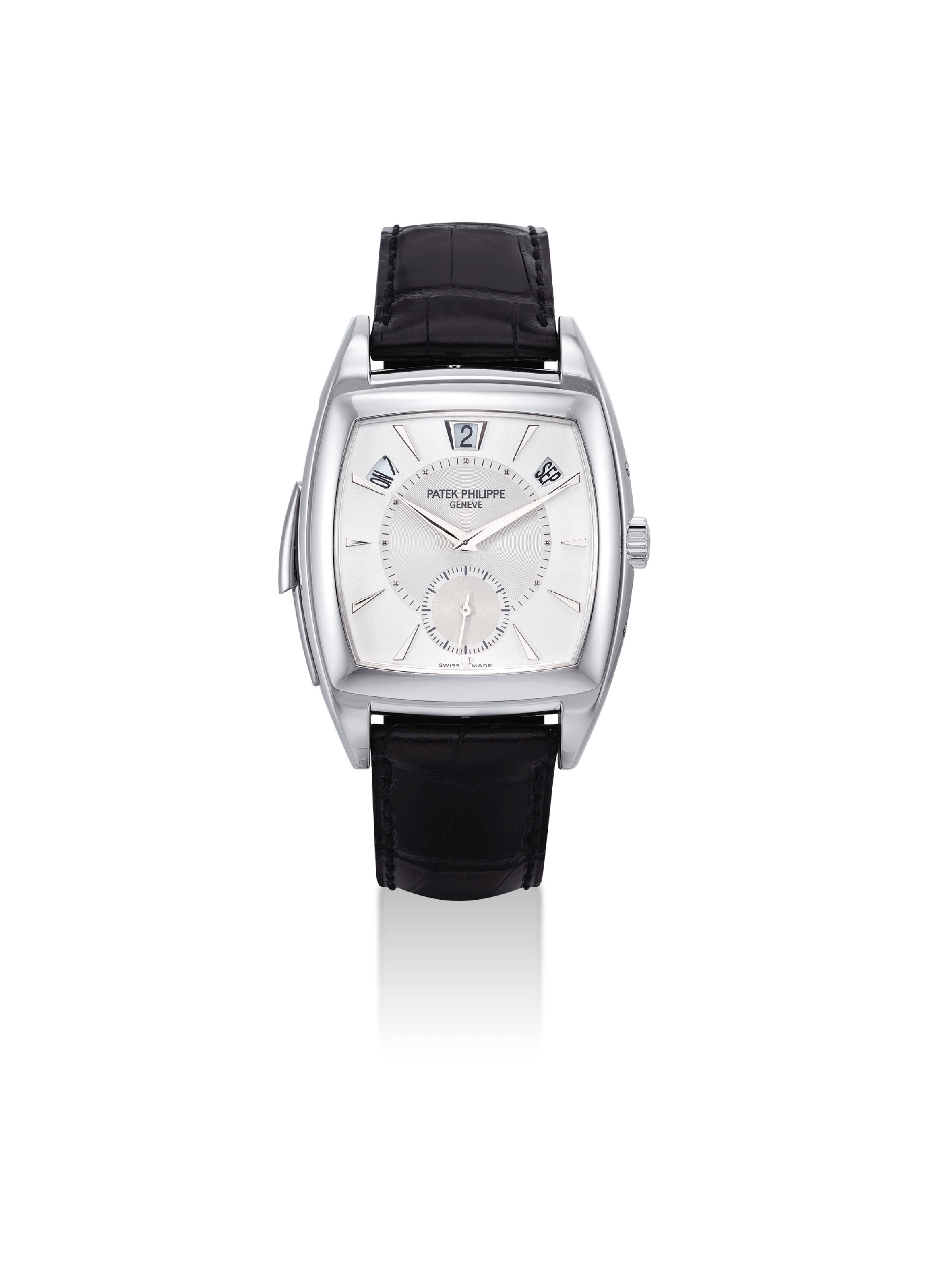PATEK PHILIPPE. A VERY FINE AND RARE PLATINUM TONNEAU-SHAPED AUTOMATIC MINUTE REPEATING ANNUAL CALENDAR WRISTWATCH WITH ORIGINAL CERTIFICATE, BOX AND ADDITIONAL CASE BACK