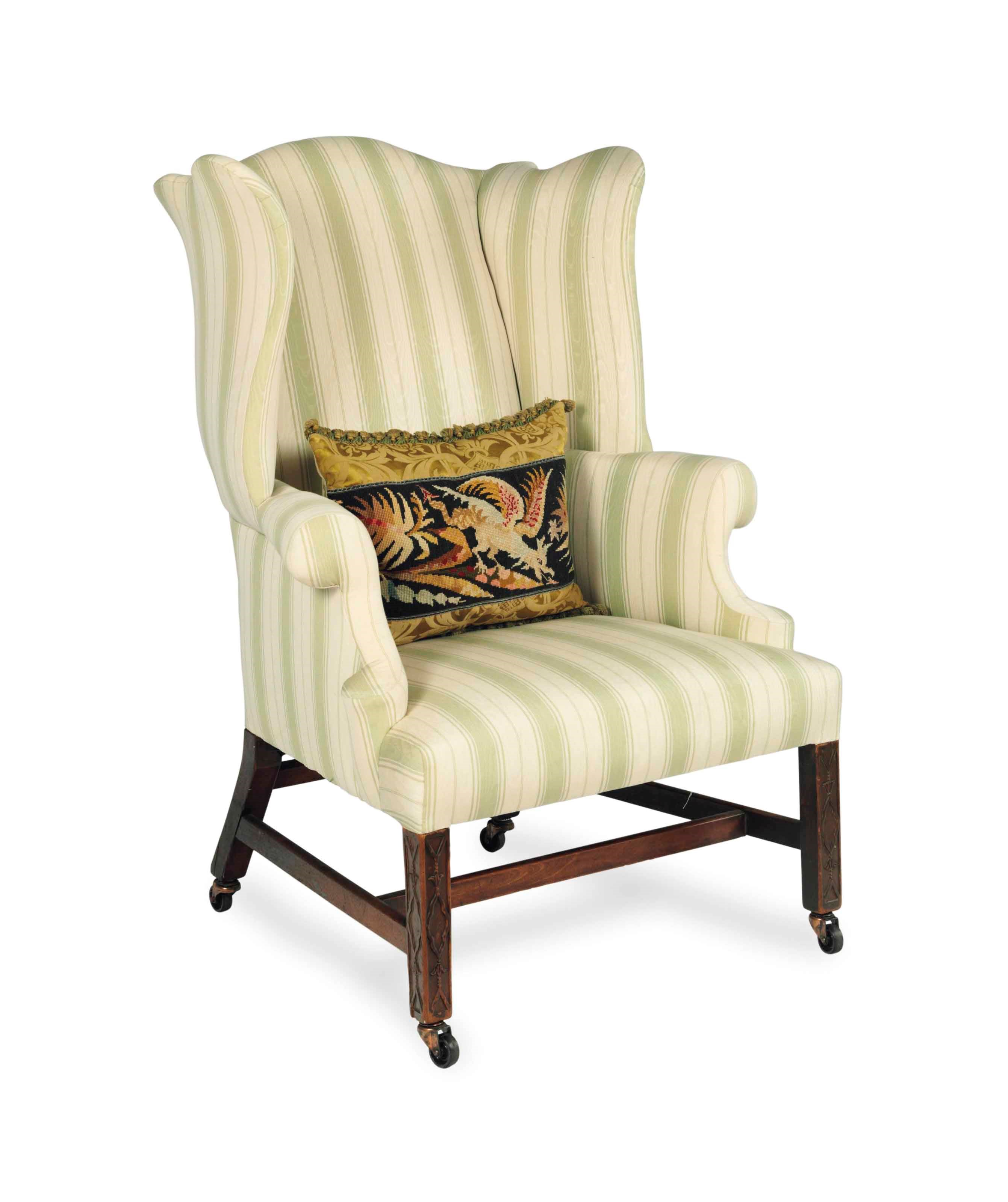A GEORGE II MAHOGANY WINGBACK ARMCHAIR,