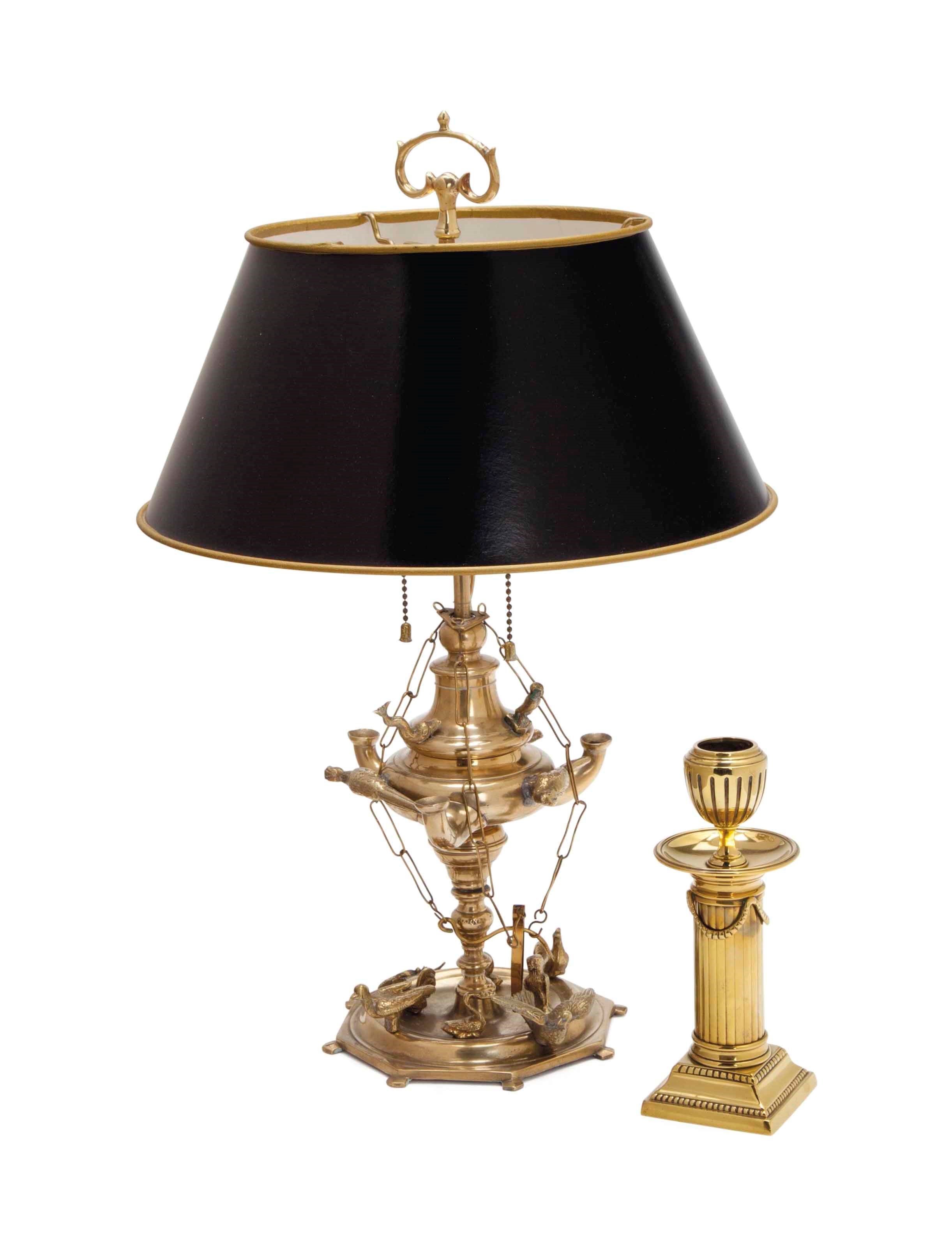 A CONTINENTAL BRASS OIL LAMP,