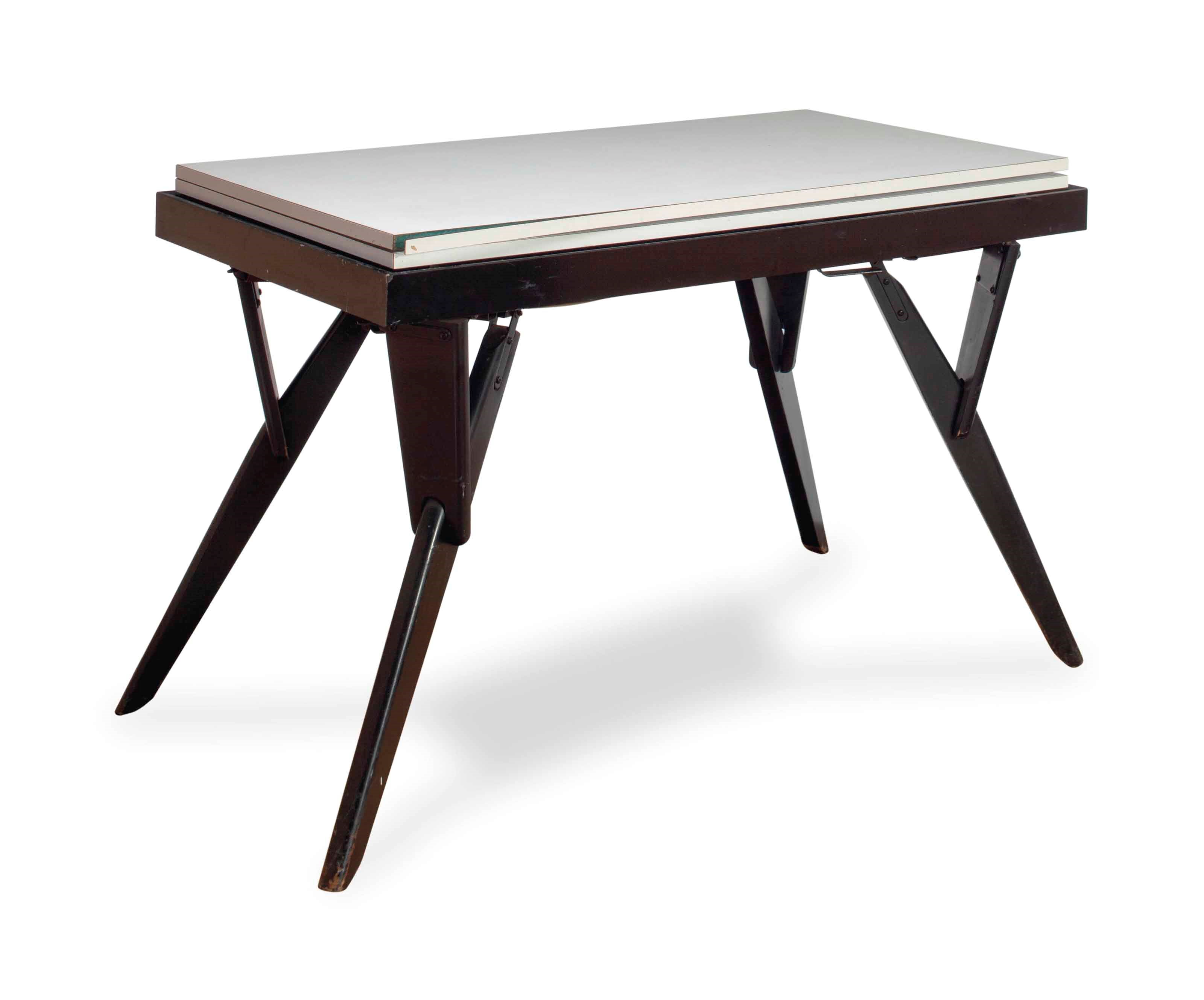 AN ITALIAN WHITE AND BLACK LAMINANT FOLD-TOP TABLE,