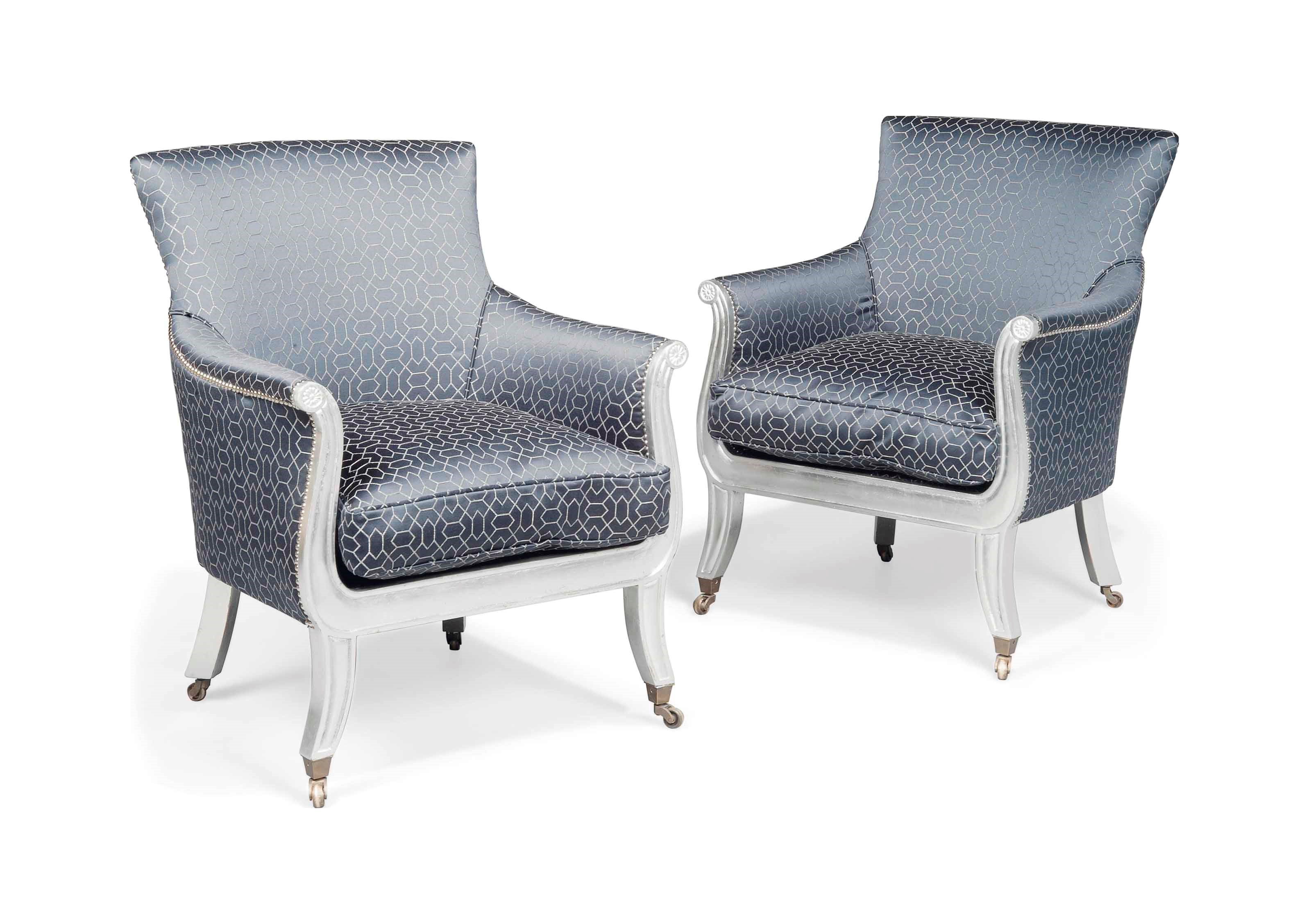 A PAIR OF SILVERED BERGERE ARMCHAIRS