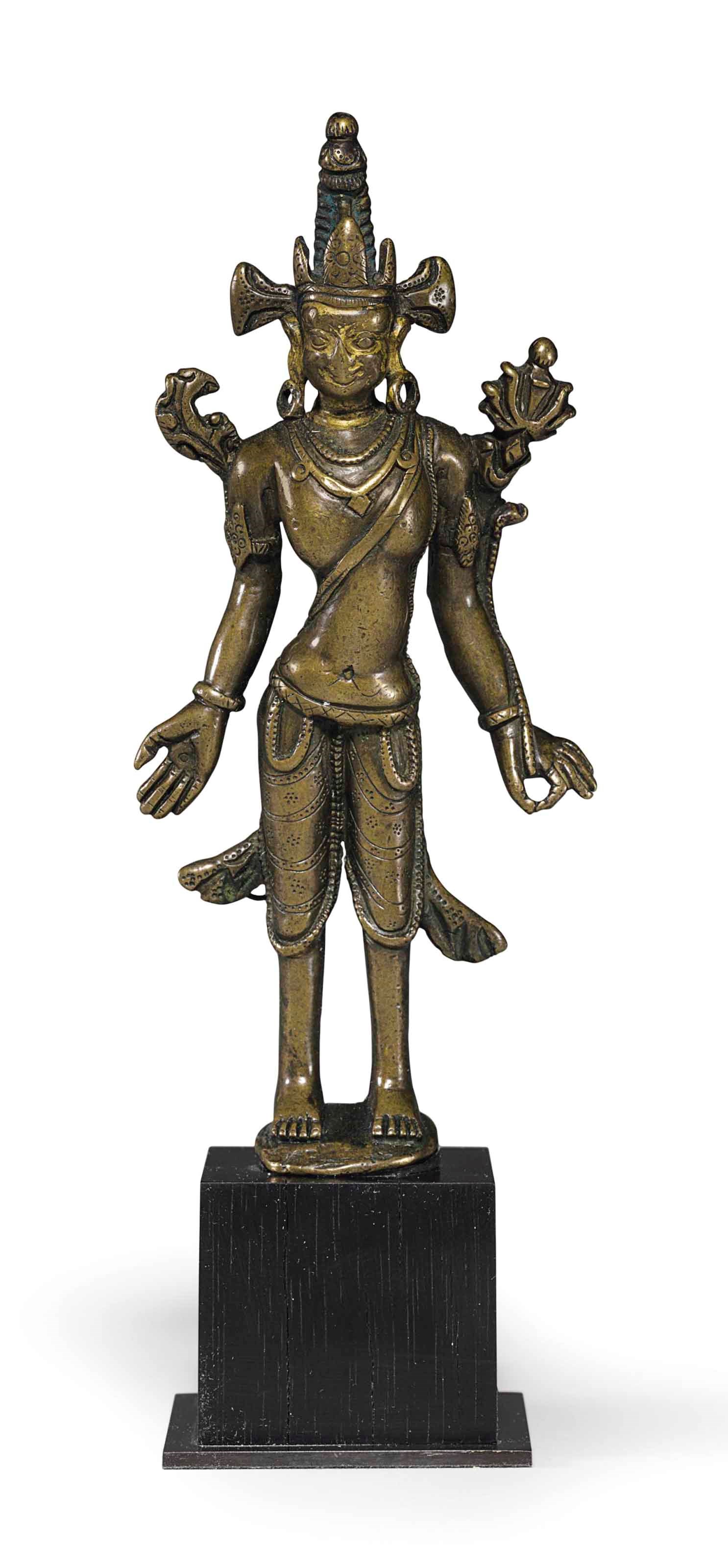 A bronze figure of a bodhisattva