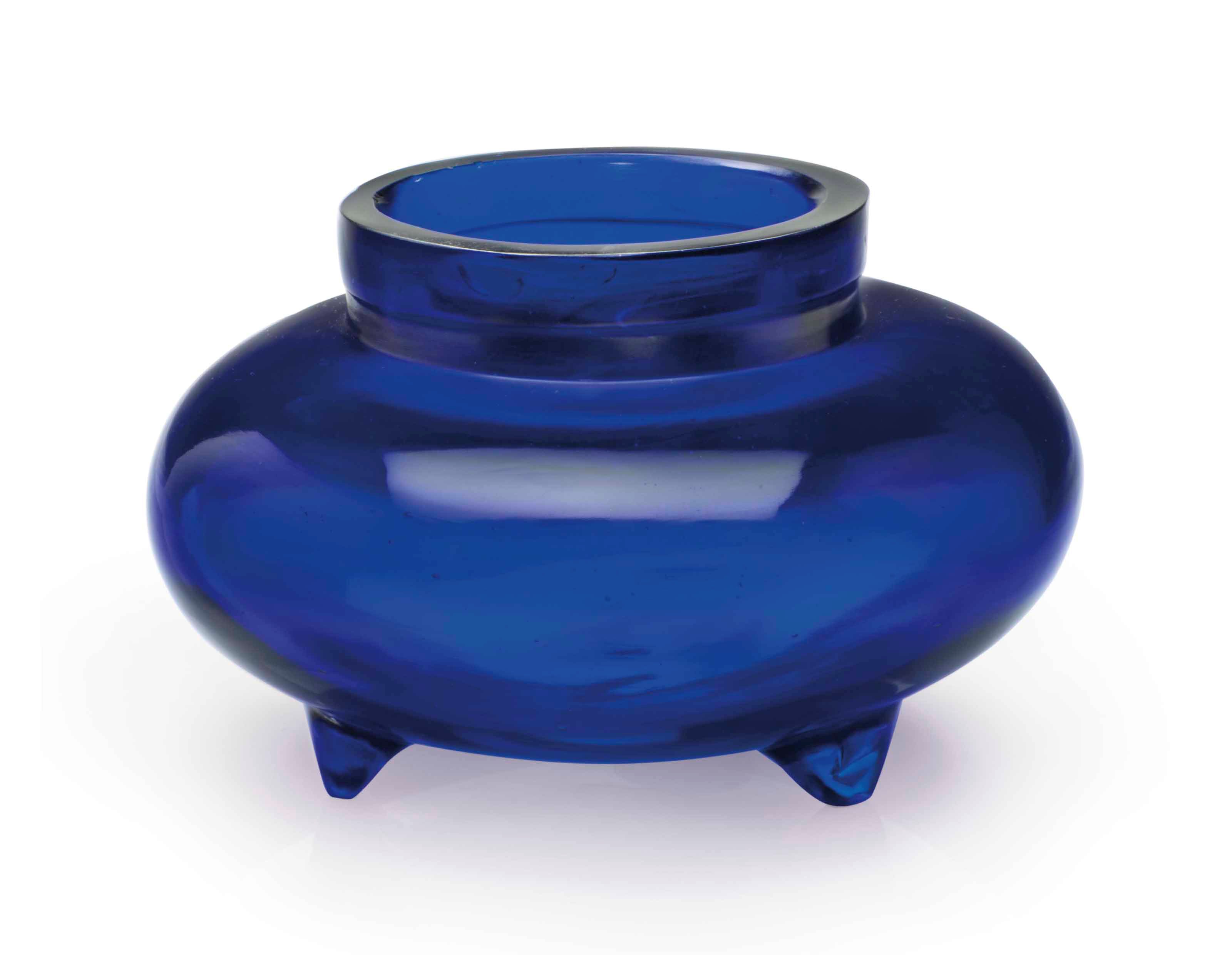 A TRANSPARENT BLUE GLASS TRIPOD INCENSE BURNER