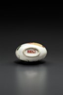 A FAMILLE ROSE PORCELAIN SNUFF BOTTLE