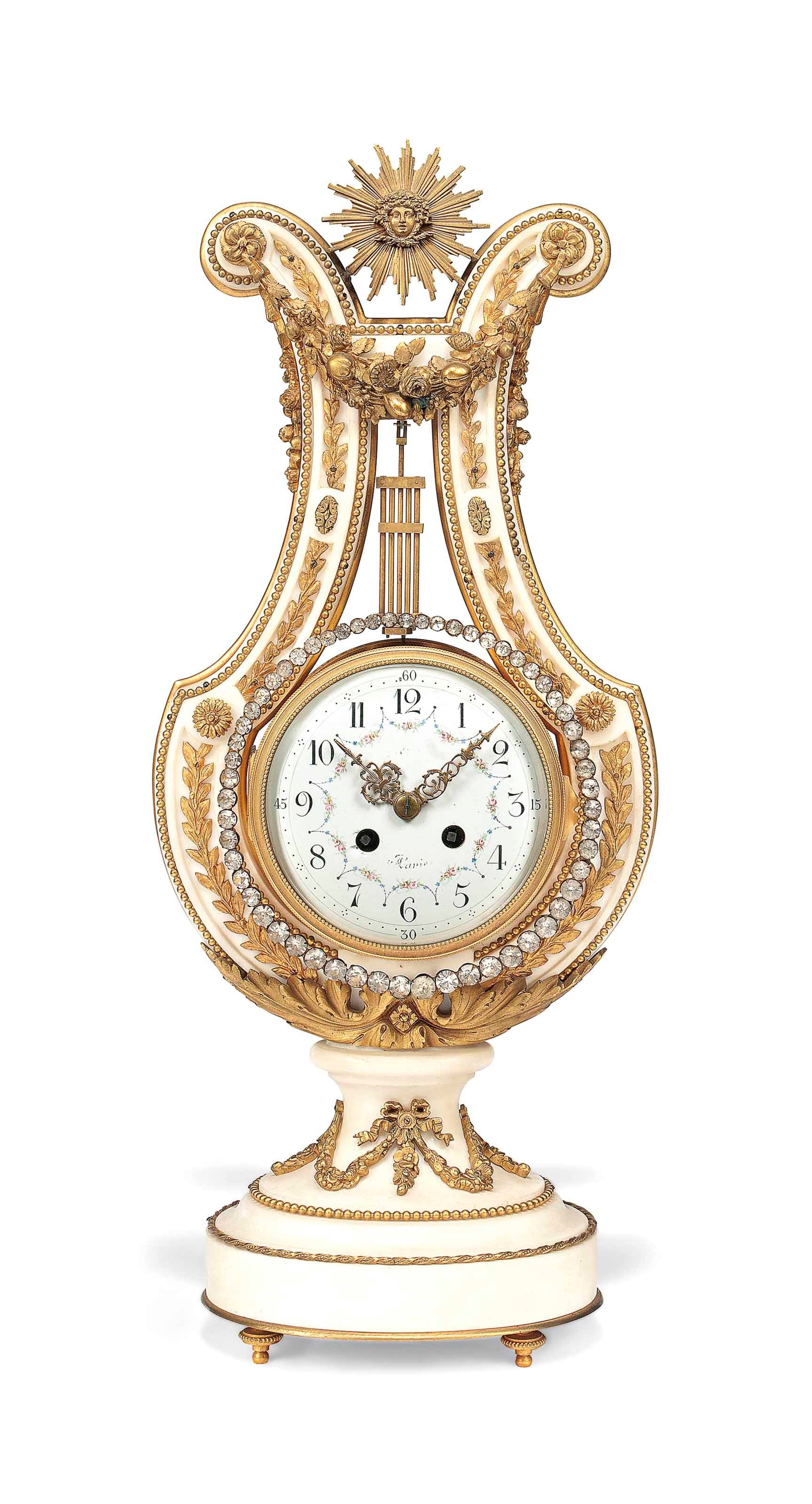 A NAPOLEON III ORMOLU-MOUNTED AND GLASS SET LYRE CLOCK