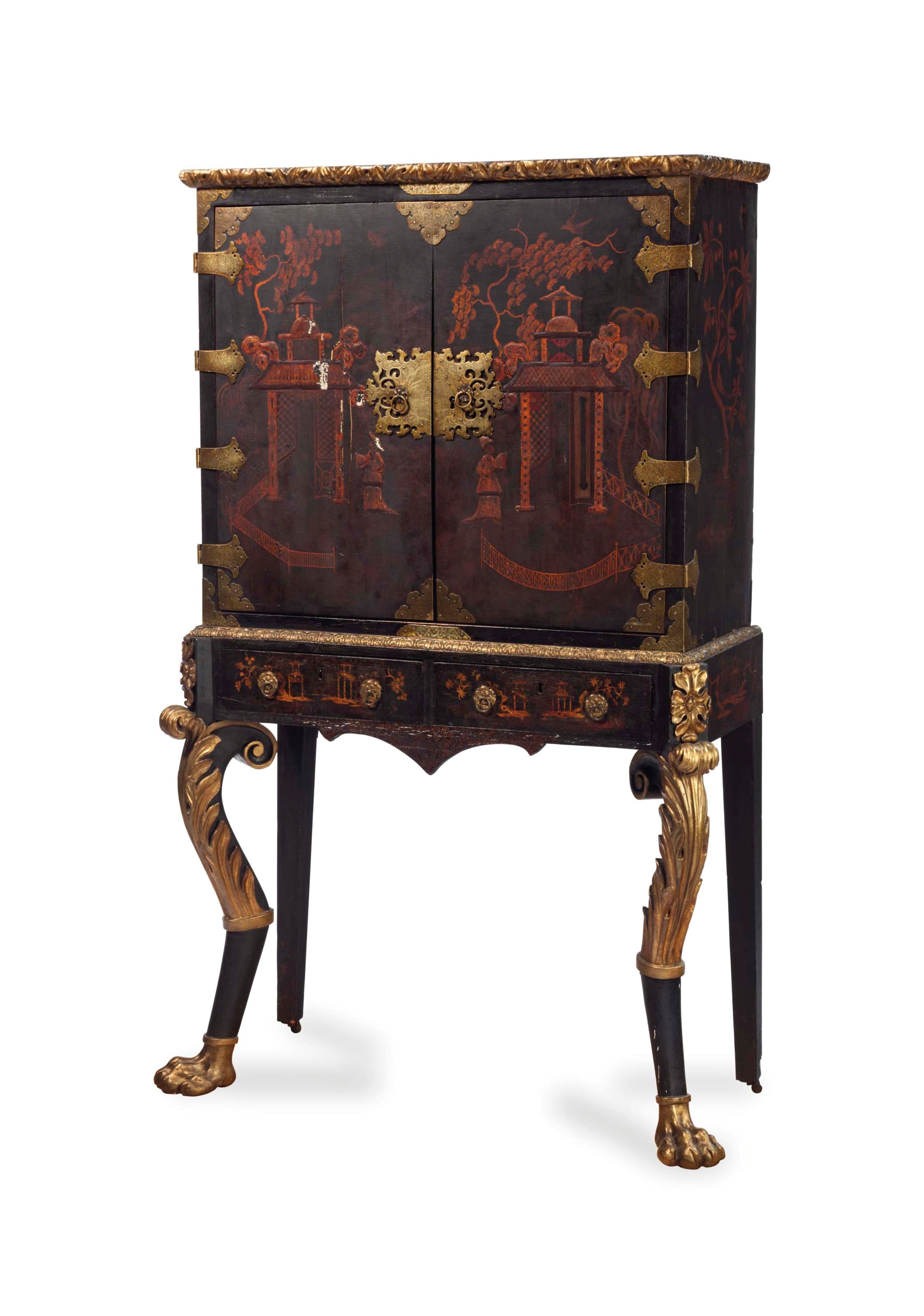 A NORTH EUROPEAN GILT METAL-MOUNTED JAPANNED AND PARCEL GILT CABINET ON STAND,