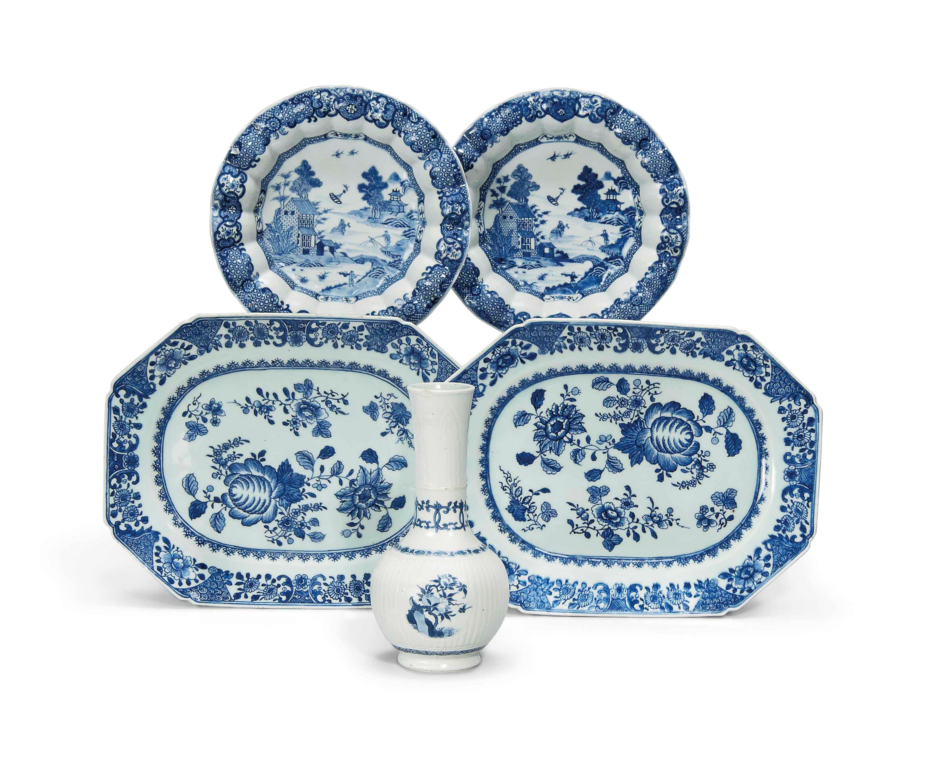A CHINESE BLUE AND WHITE RIBBED BOTTLE VASE AND FOUR DISHES