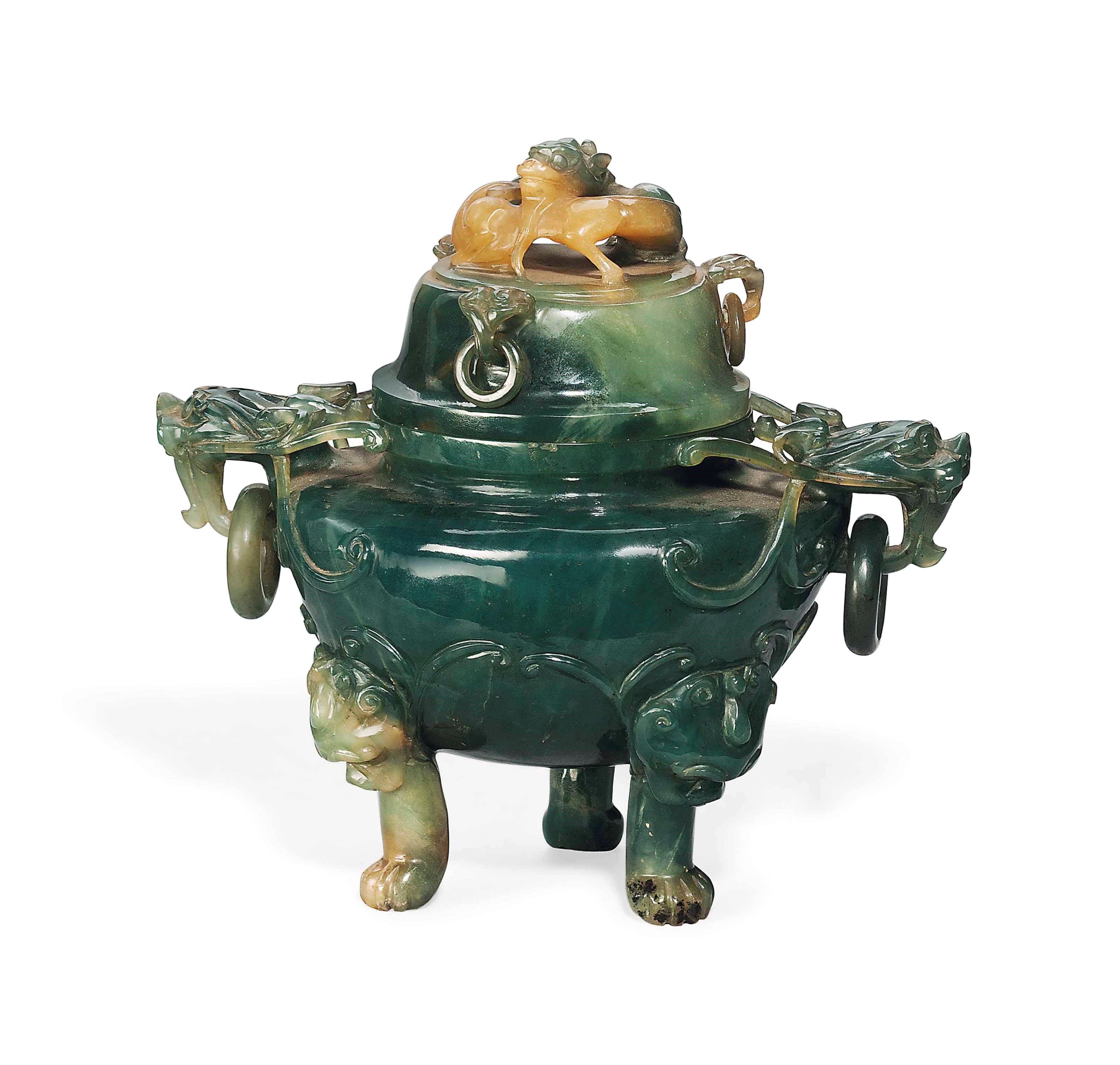 A CHINESE CARVED AND PIERCED JADEITE CENSER AND COVER