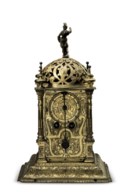 A GERMAN ENGRAVED GILT-BRASS STRIKING TABLE CLOCK