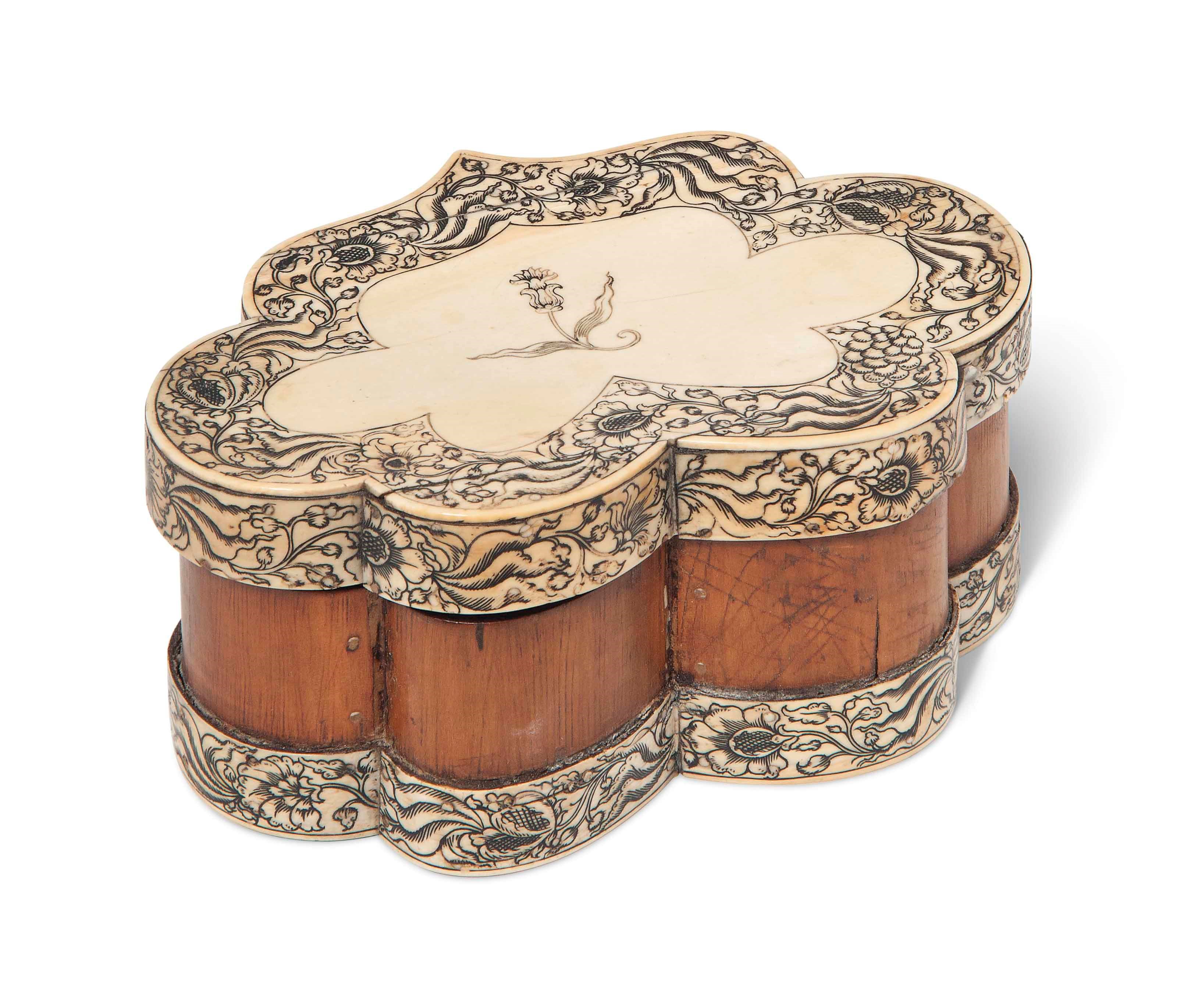 A VIZAGAPATAM IVORY-VENEERED SCALLOPED SANDALWOOD BOX
