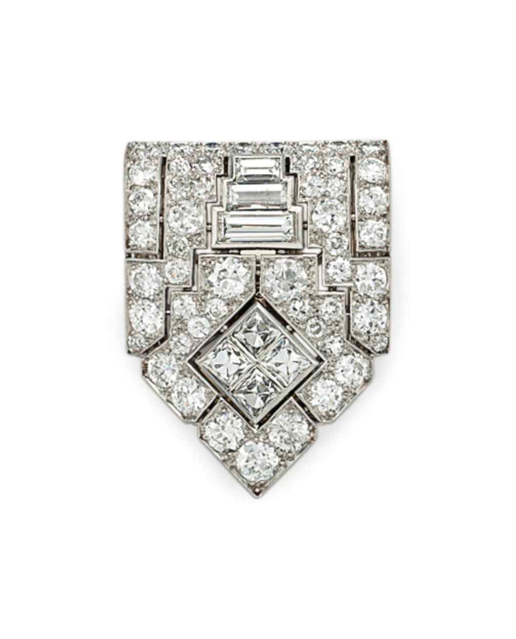 AN ART DECO DIAMOND CLIP BROOCH, BY CARTIER