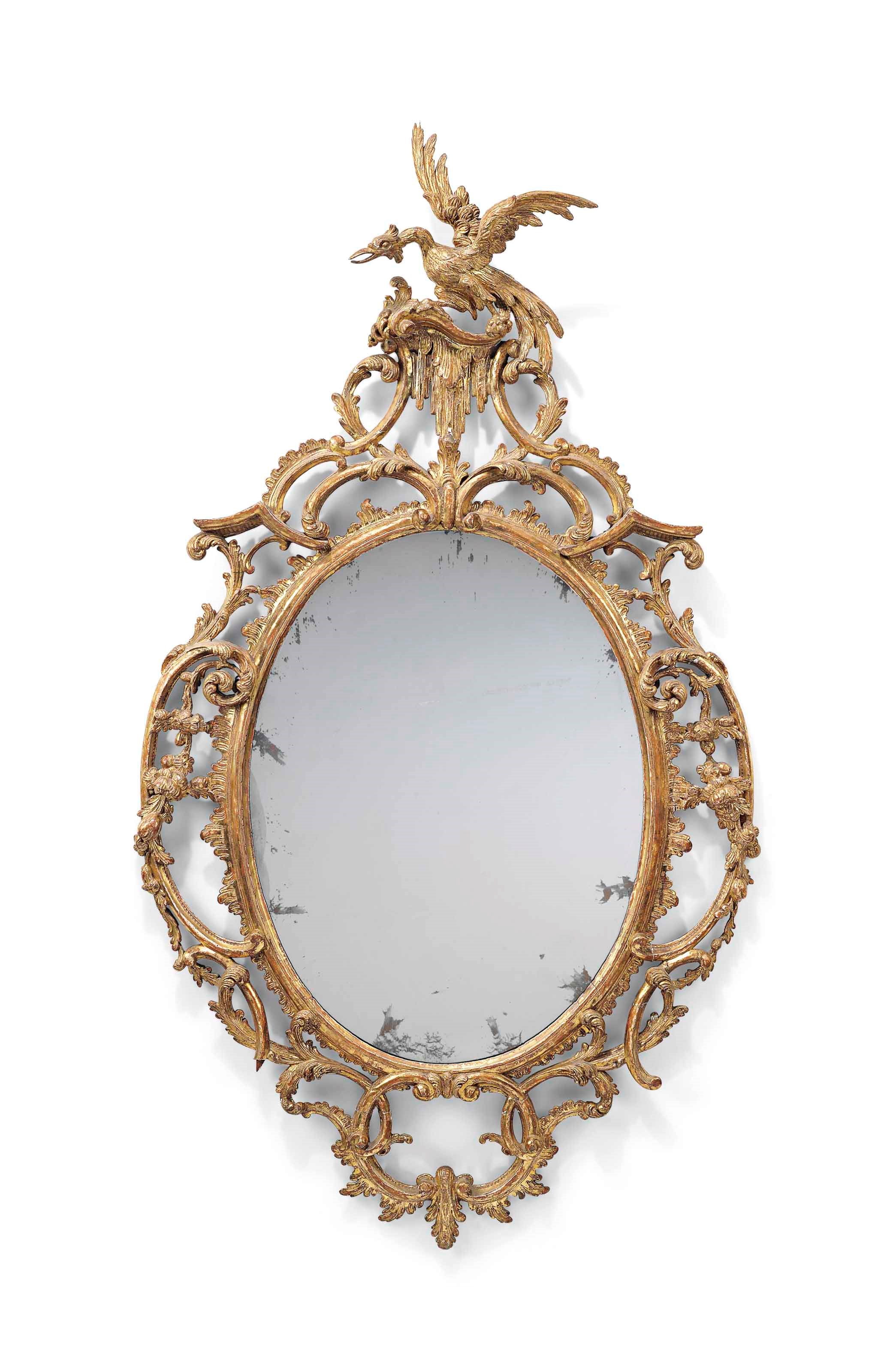 A GEORGE III GILTWOOD OVAL MIRROR