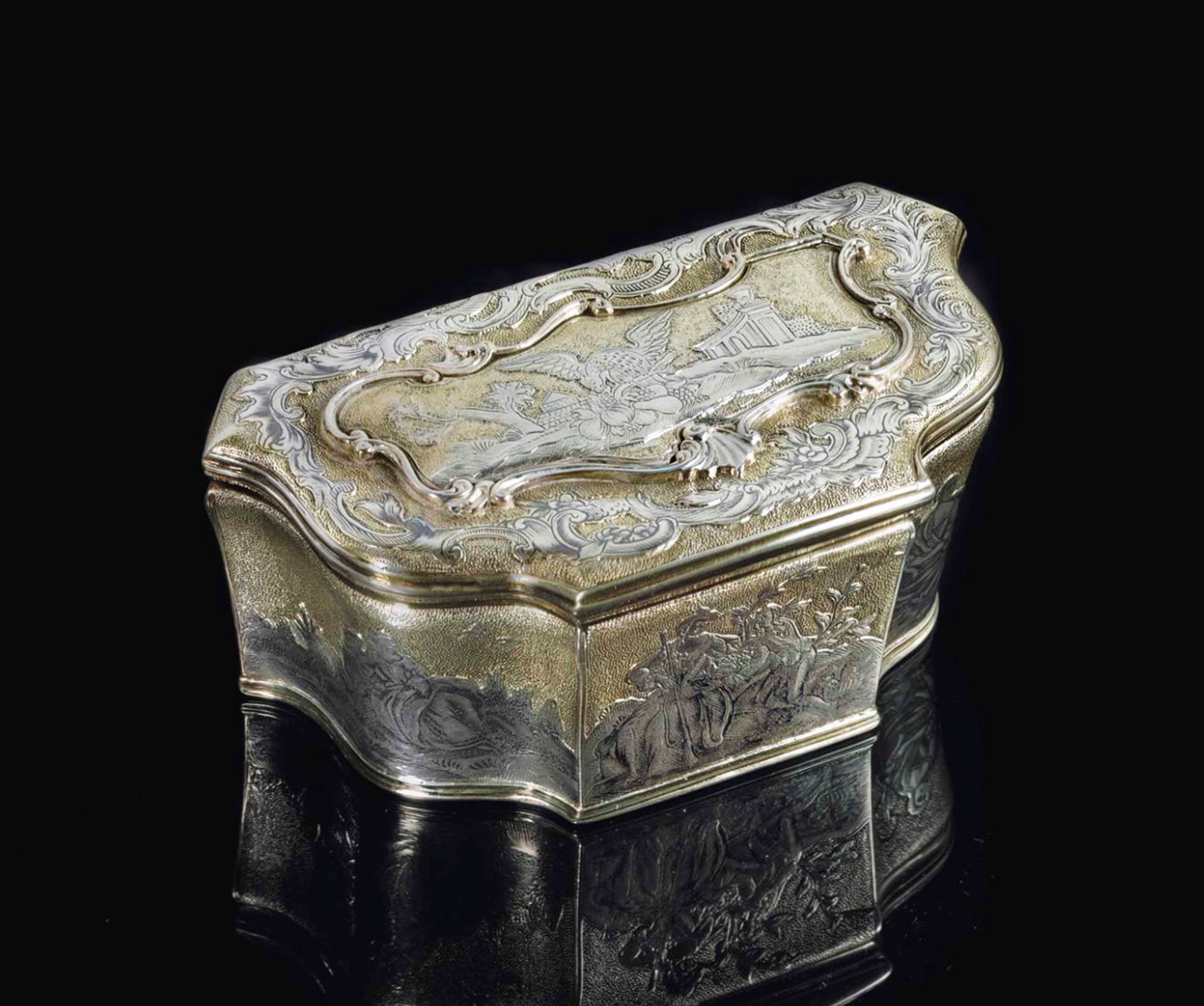 A PARCEL-GILT SILVER AND NIELLO SNUFF BOX
