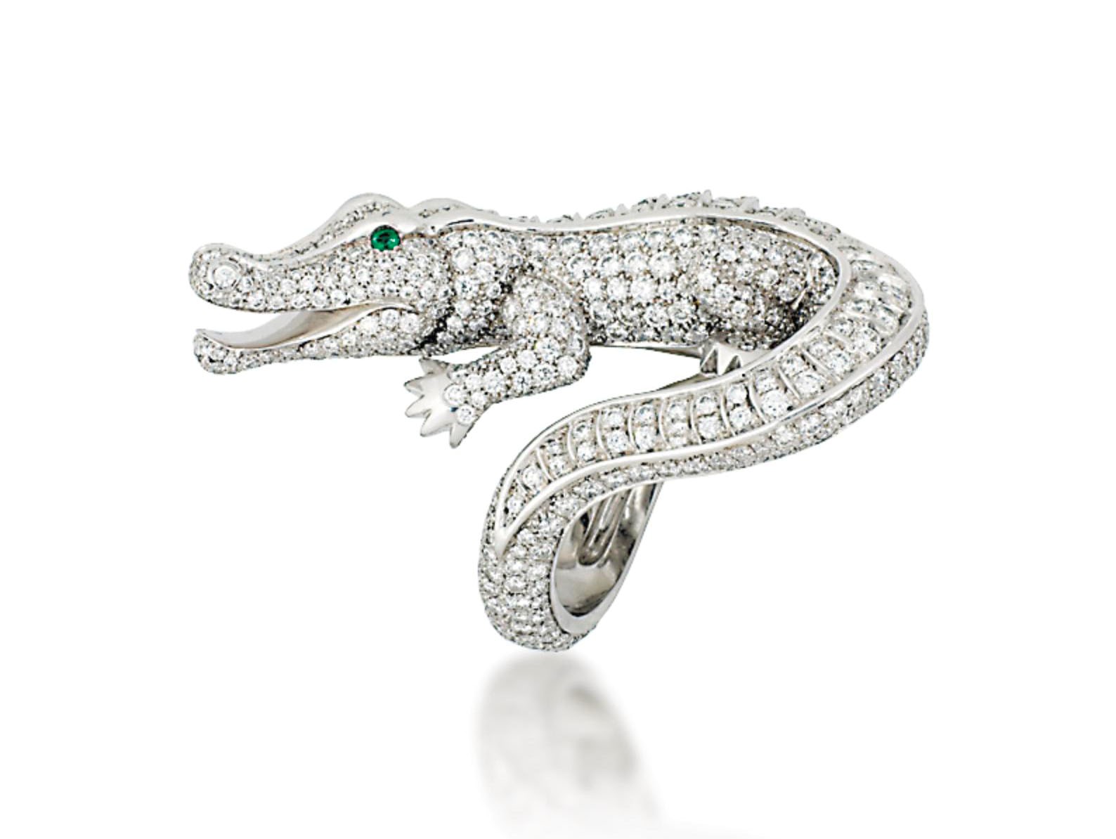 A DIAMOND AND EMERALD DRESS RING, BY CARTIER