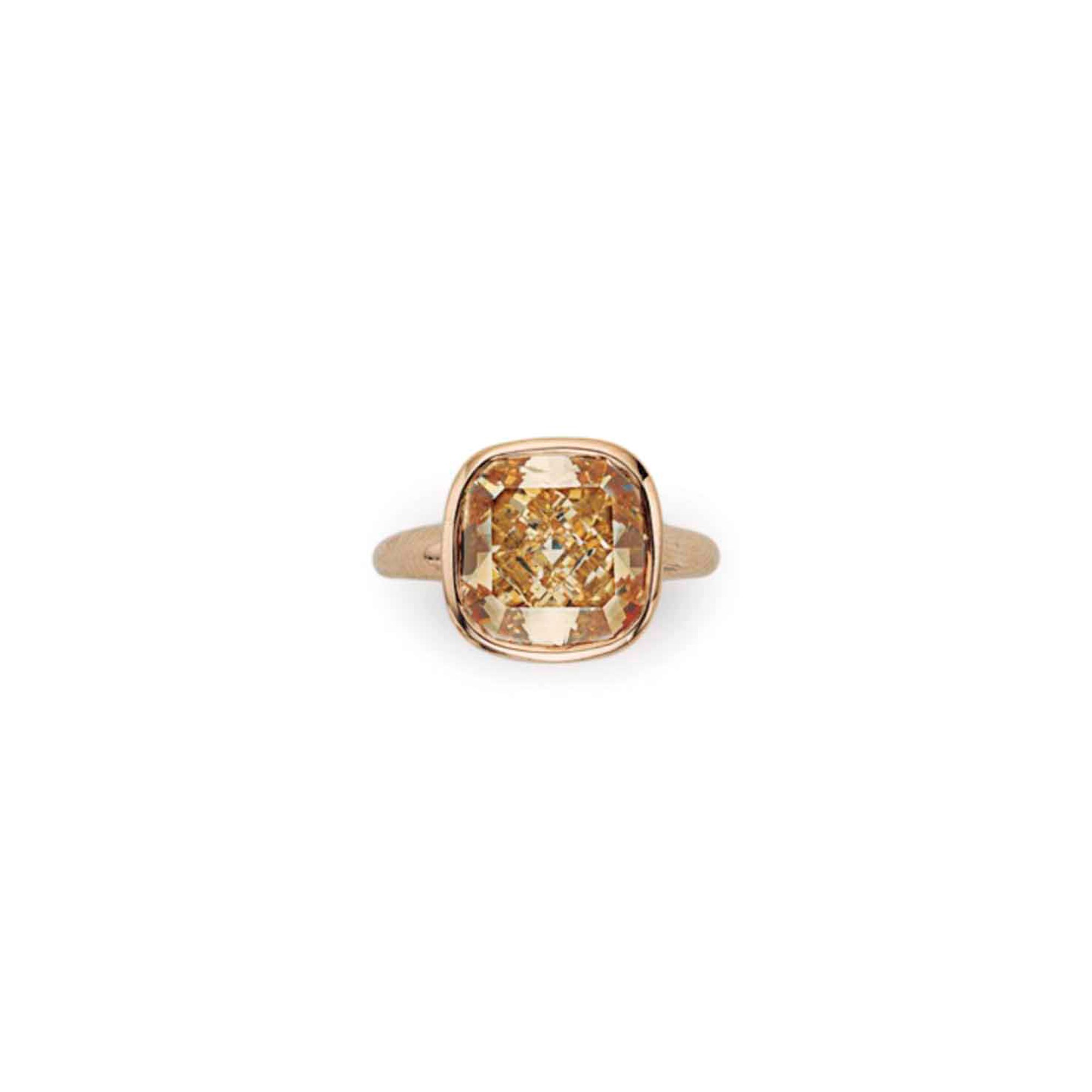 A COLORED DIAMOND RING