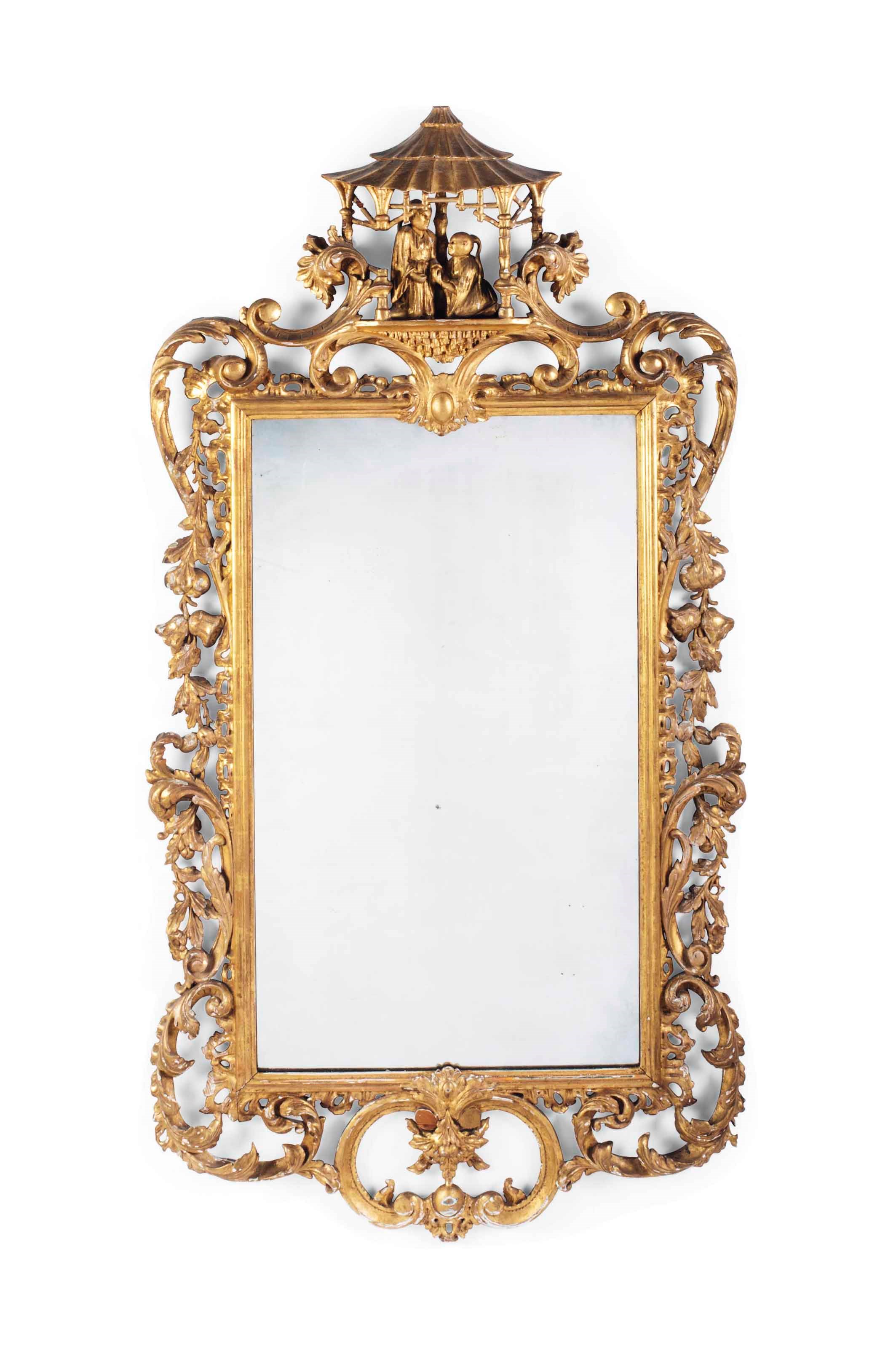A VICTORIAN CARVED GILTWOOD MIRROR
