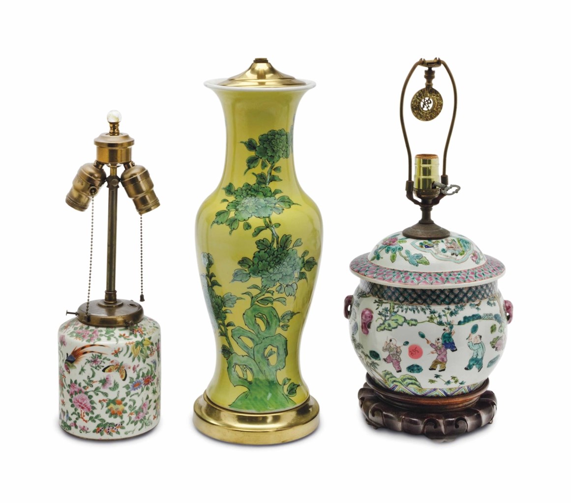 A CHINESE YELLOW-GLAZED BALUSTER VASE, AND TWO CHINESE VESSELS, MOUNTED AS A LAMPS,