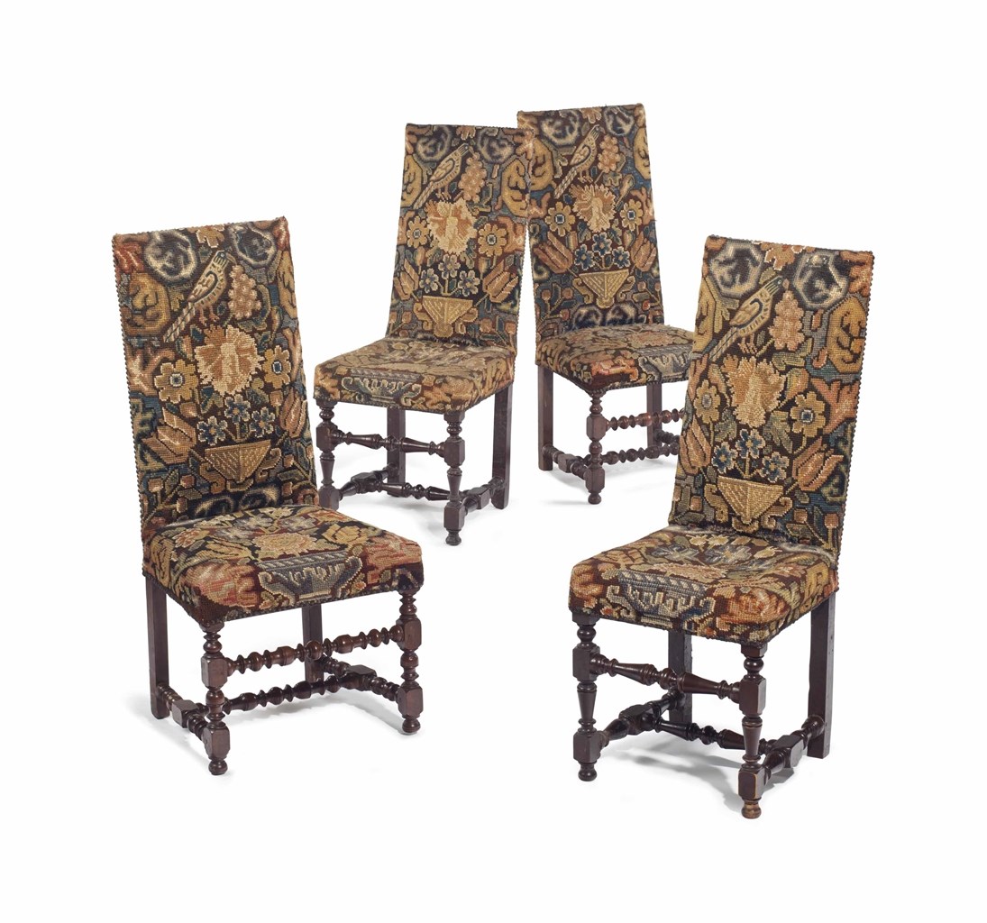 A MATCHED SET OF FOUR FRANCO-FLEMISH WALNUT AND NEEDLEWORK UPHOLSTERED TALL BACK SIDE CHAIRS,