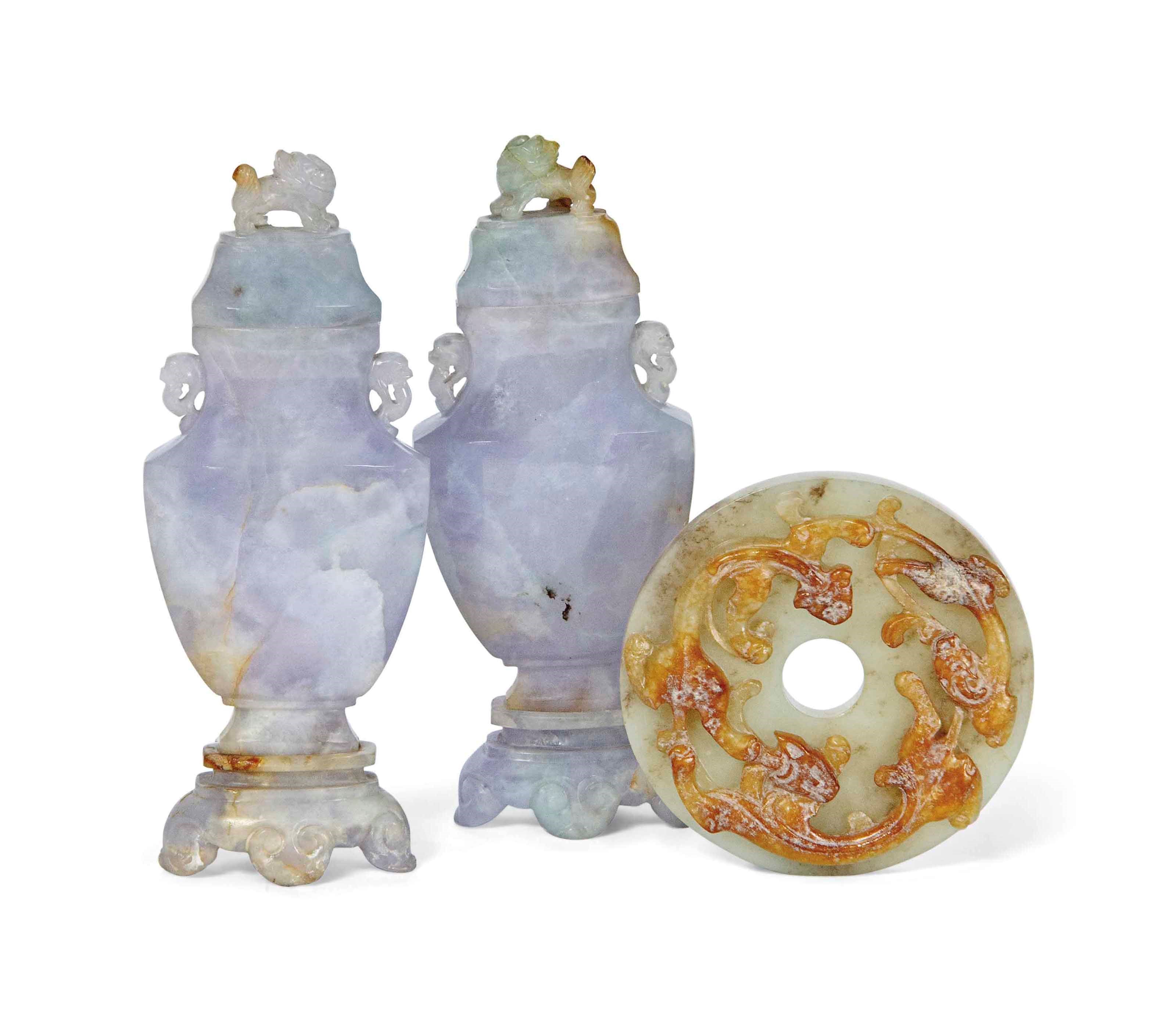 A CHINESE JADE 'CHILONG' BI DISC AND A PAIR OF JADEITE VASES AND COVERS