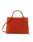 SAC KELLY SELLIER 35 EN CROCODILE POROSUS LISSE ORANGE, GARNITURE EN MÉTAL DORÉ