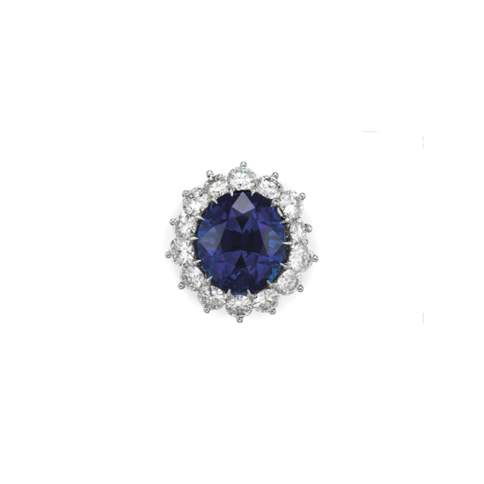 A SAPPHIRE AND DIAMOND RING