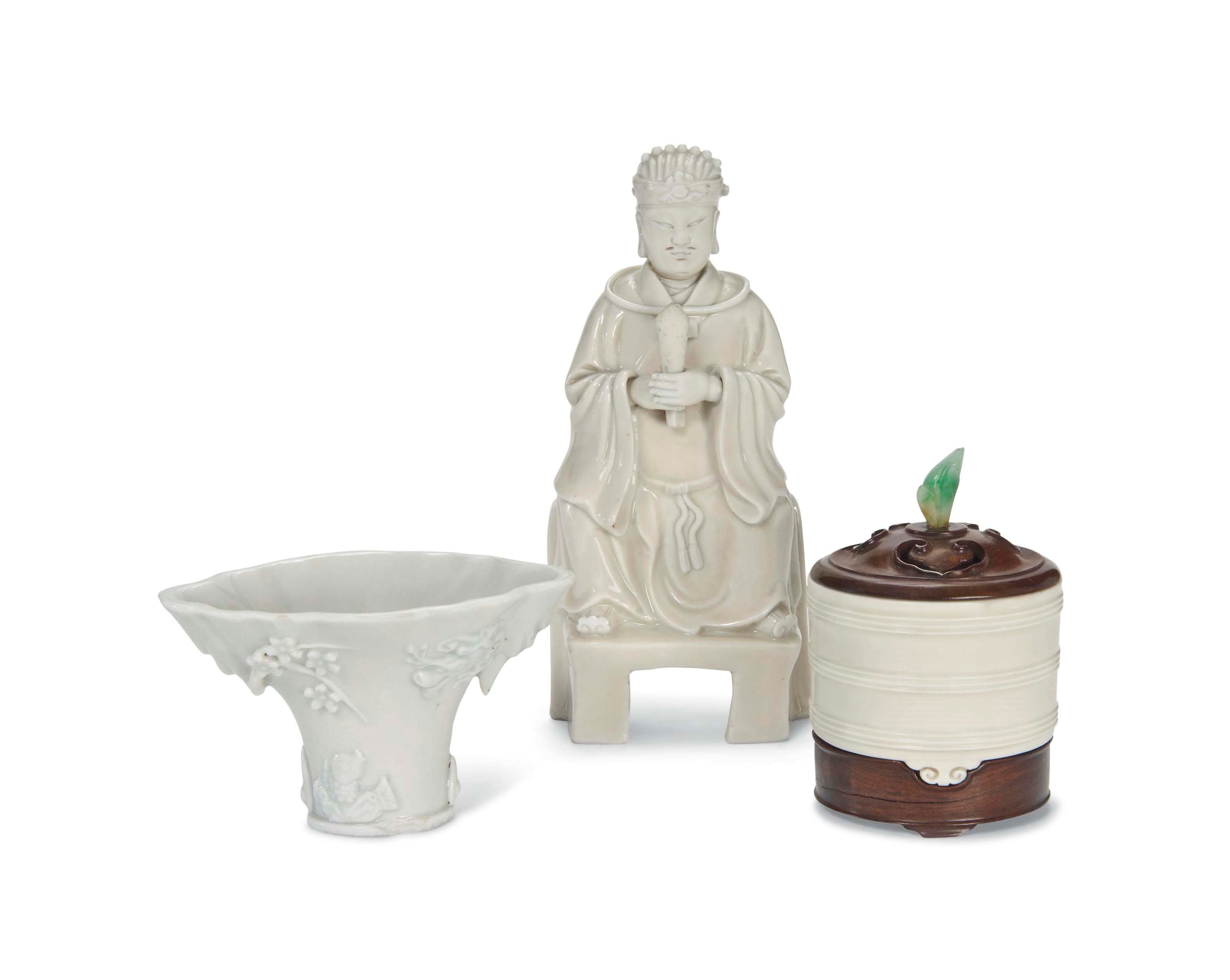 A GROUP OF THREE DEHUA PORCELAINS