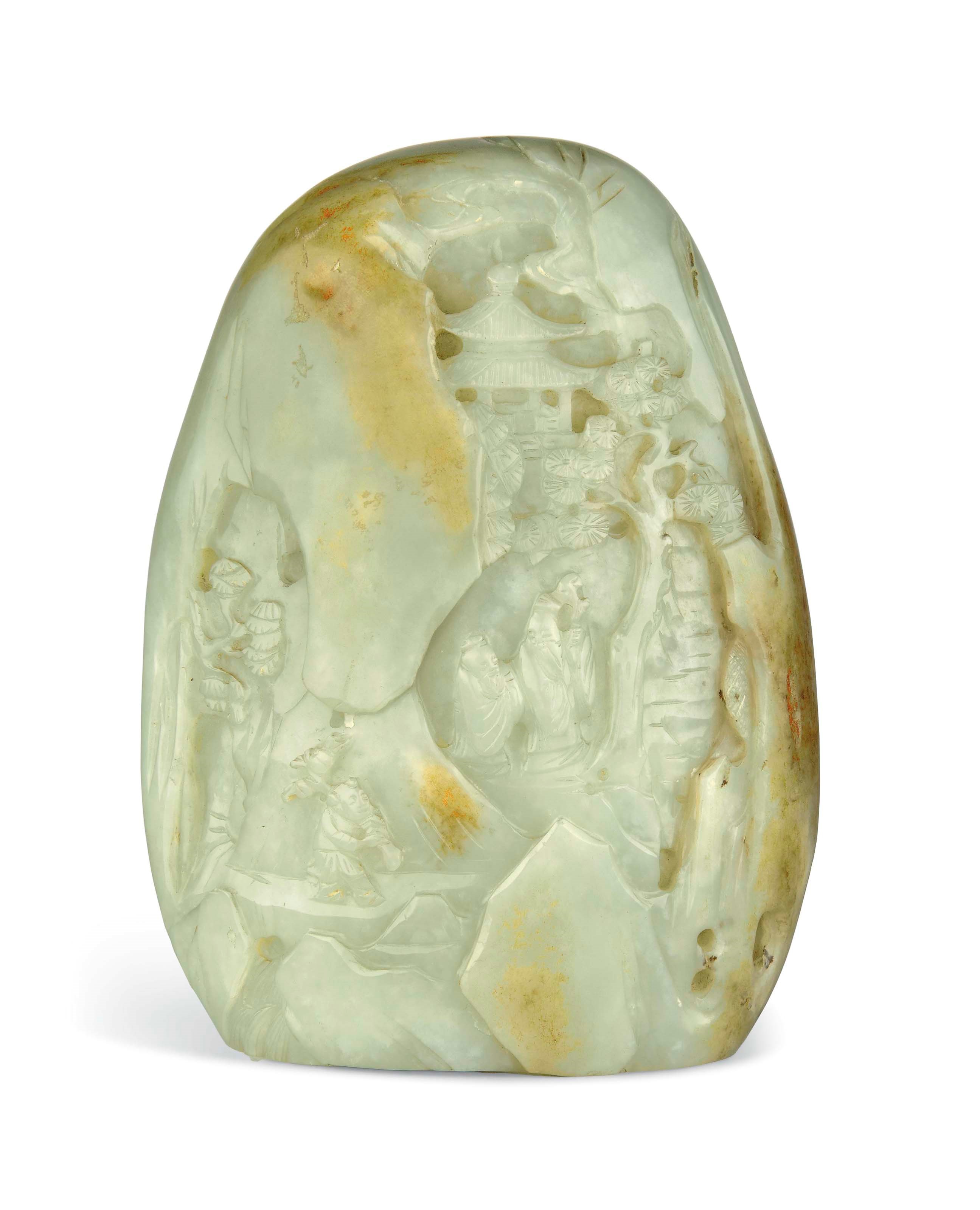 A CELADON AND RUSSET JADE BOULDER