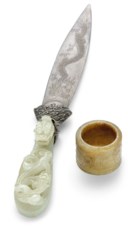 A RUSSET JADE ARCHER'S RING AND A JADE-HANDLED KNIFE