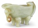 A PALE CELADON AND RUSSET JADE POURING VESSEL, YI