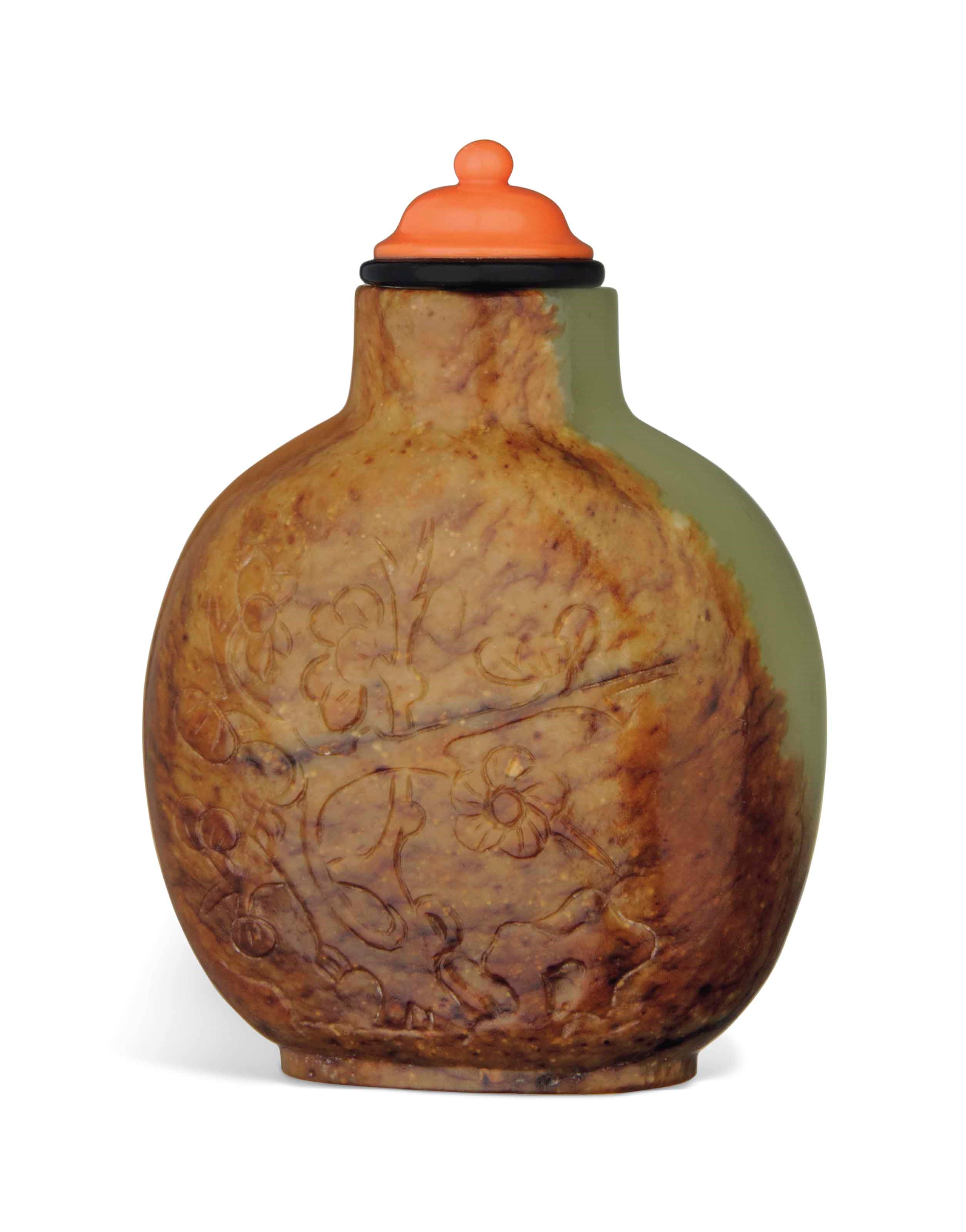 A CELADON AND RUSSET JADE SNUFF BOTTLE