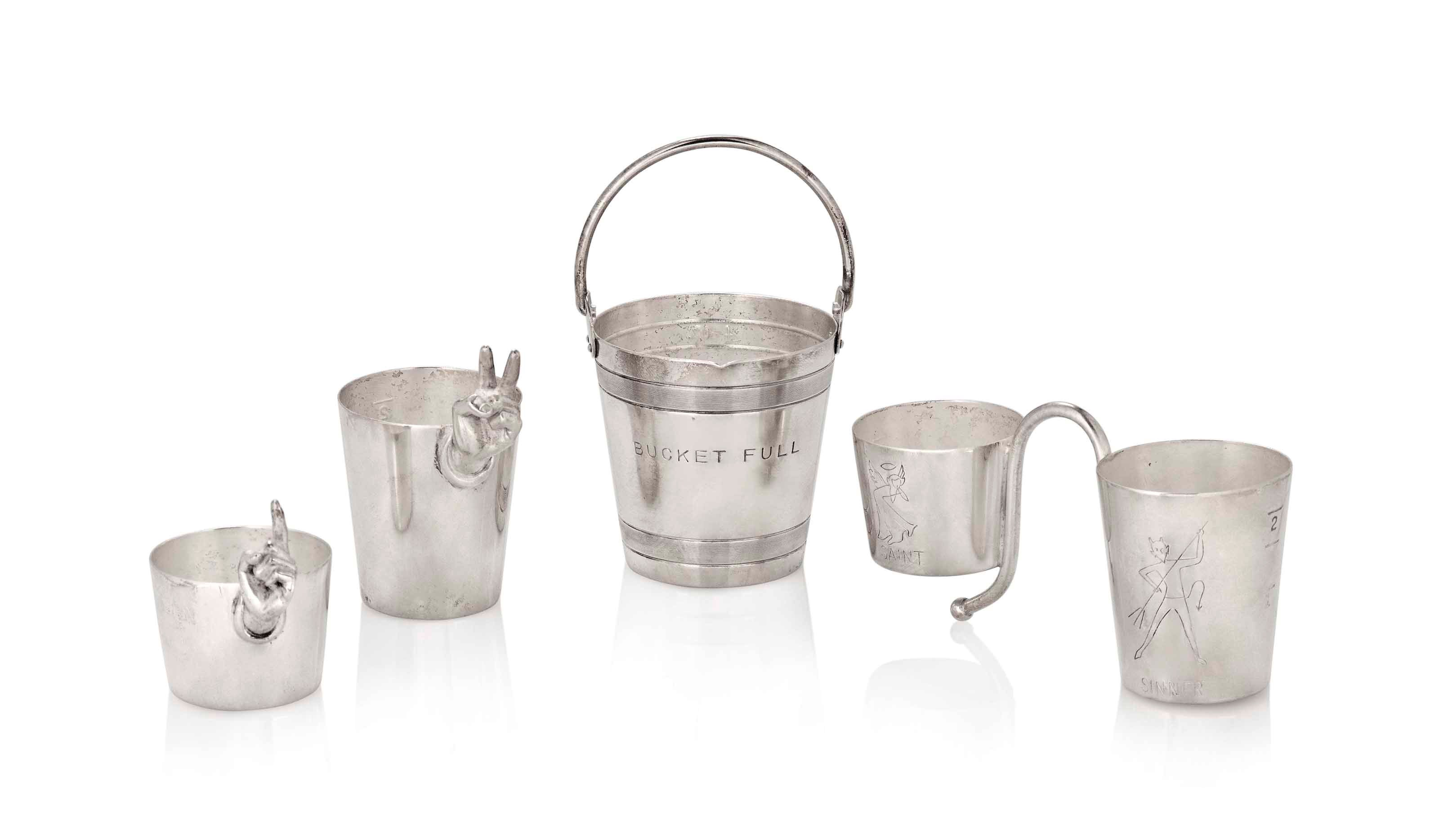 A GROUP OF FOUR NAPIER SILVER PLATED JIGGERS