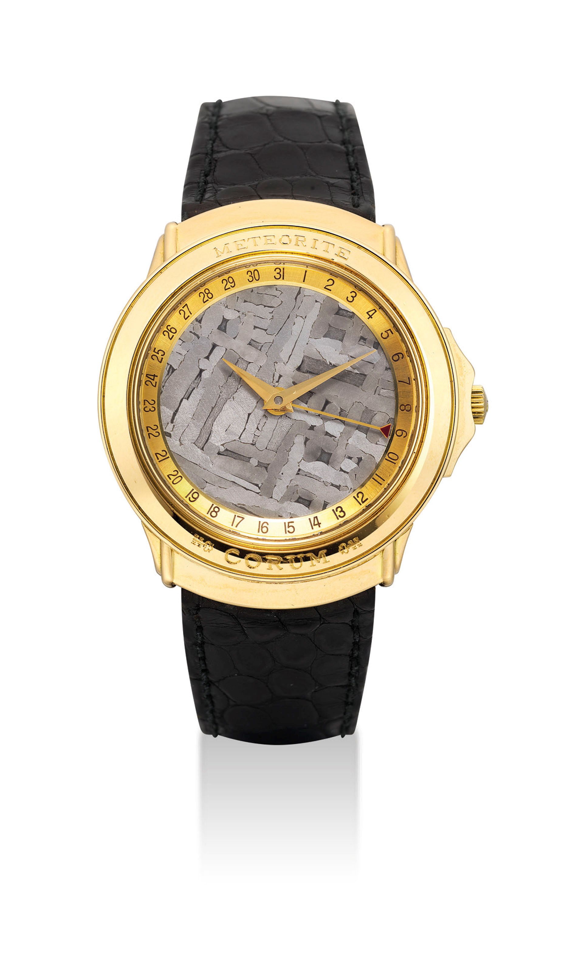 CORUM. AN 18K GOLD AUTOMATIC WRISTWATCH WITH DATE AND METEORITE DIAL