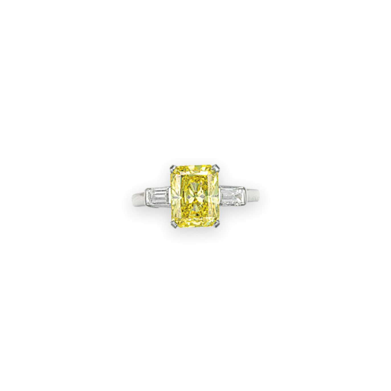 A COLORED DIAMOND AND DIAMOND RING, BY CARVIN FRENCH