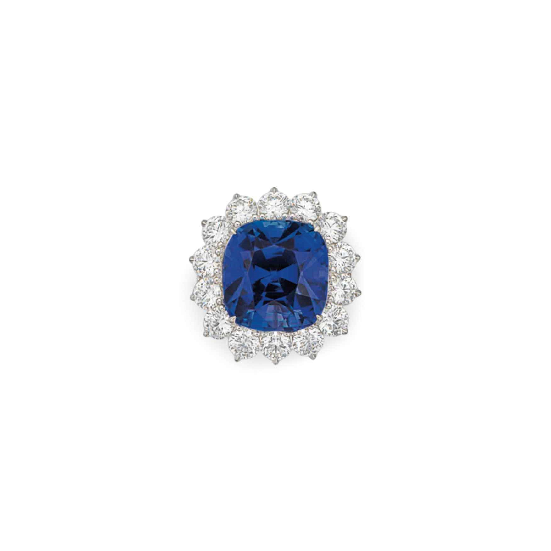 A SAPPHIRE AND DIAMOND RING