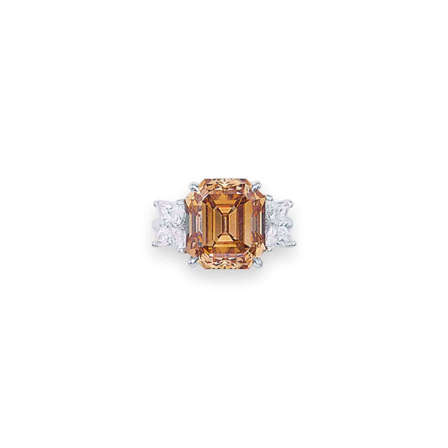 A COLORED DIAMOND AND DIAMOND 'MARQUESA' RING, BY HARRY WINSTON