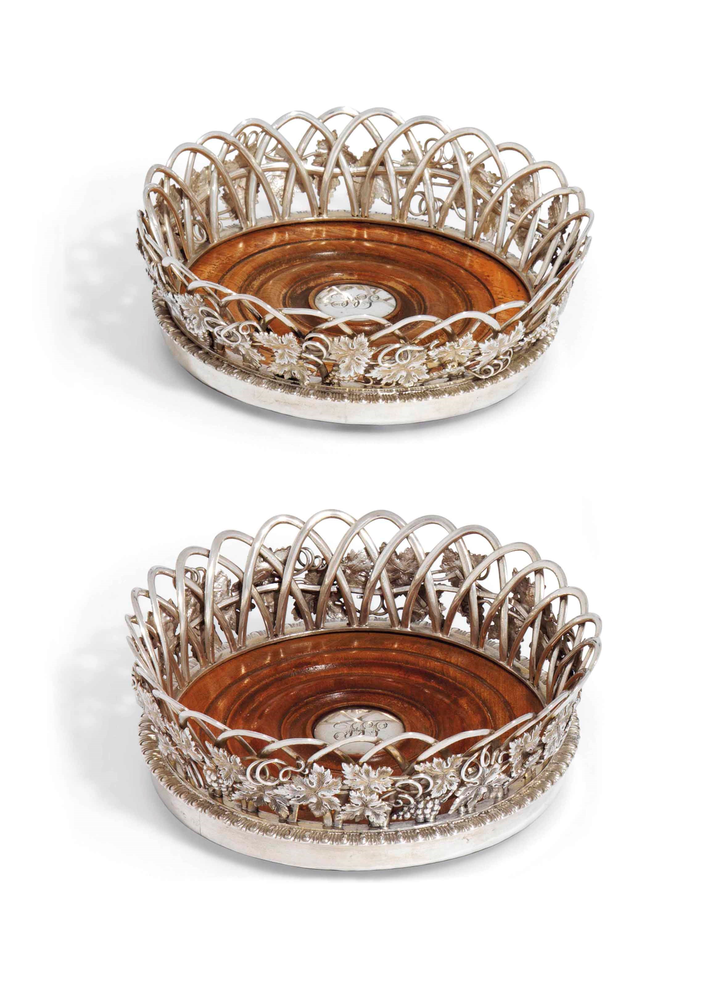 A GEORGE IV AND A WILLIAM IV SILVER WINE COASTER