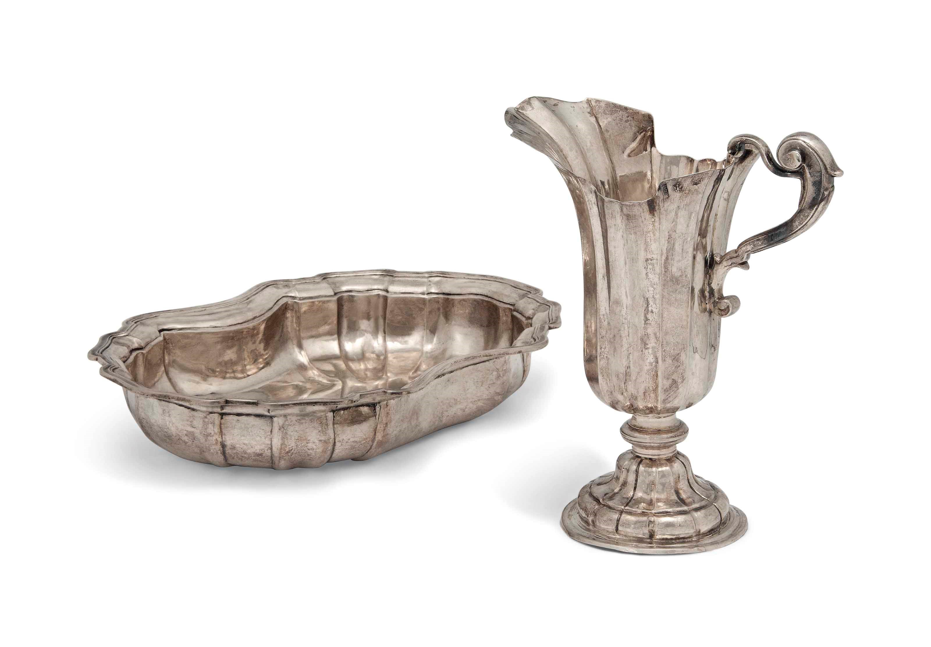AN ITALIAN SILVER EWER AND BASIN