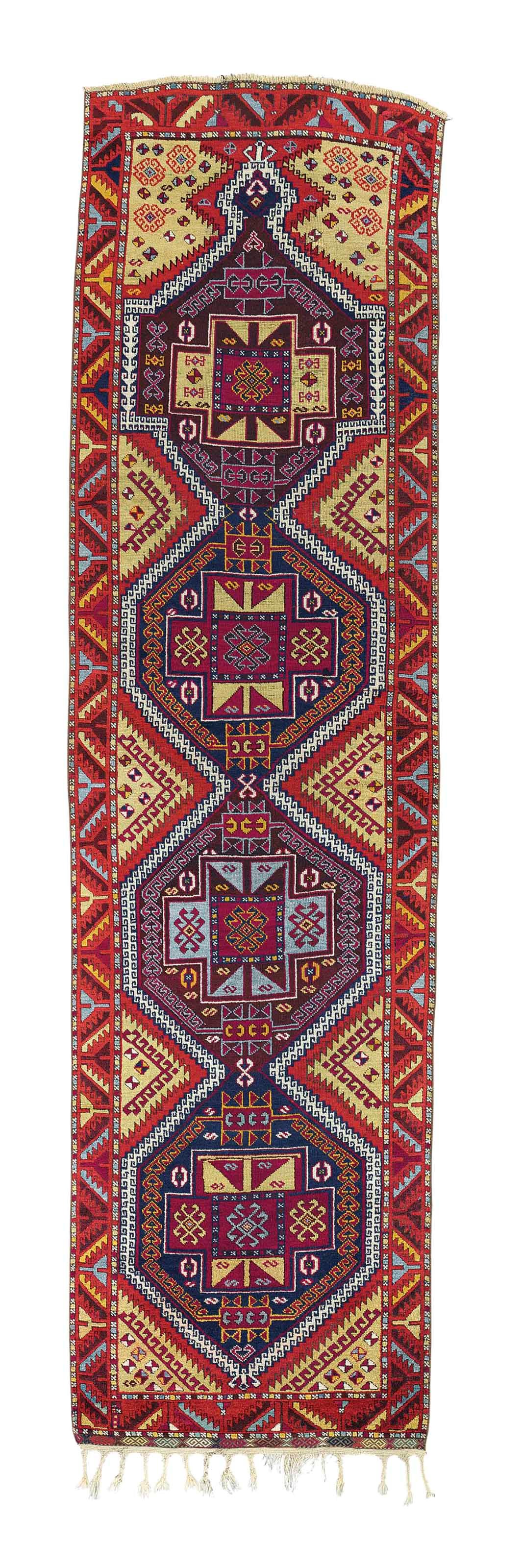AN ANTIQUE ANATOLIAN LONG RUG, TURKEY
