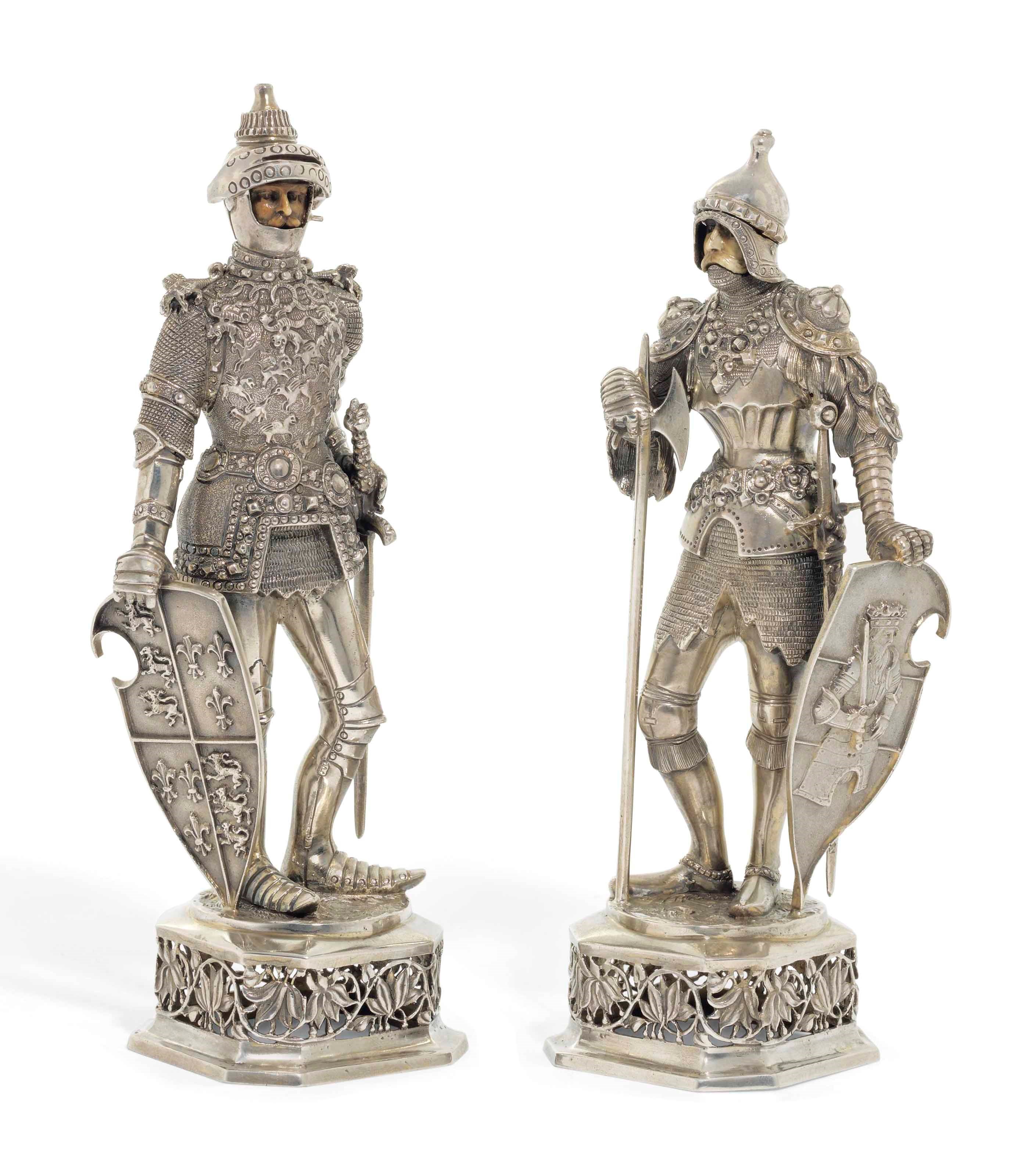 A PAIR OF GERMAN SILVER AND IVORY FIGURES OF KNIGHTS