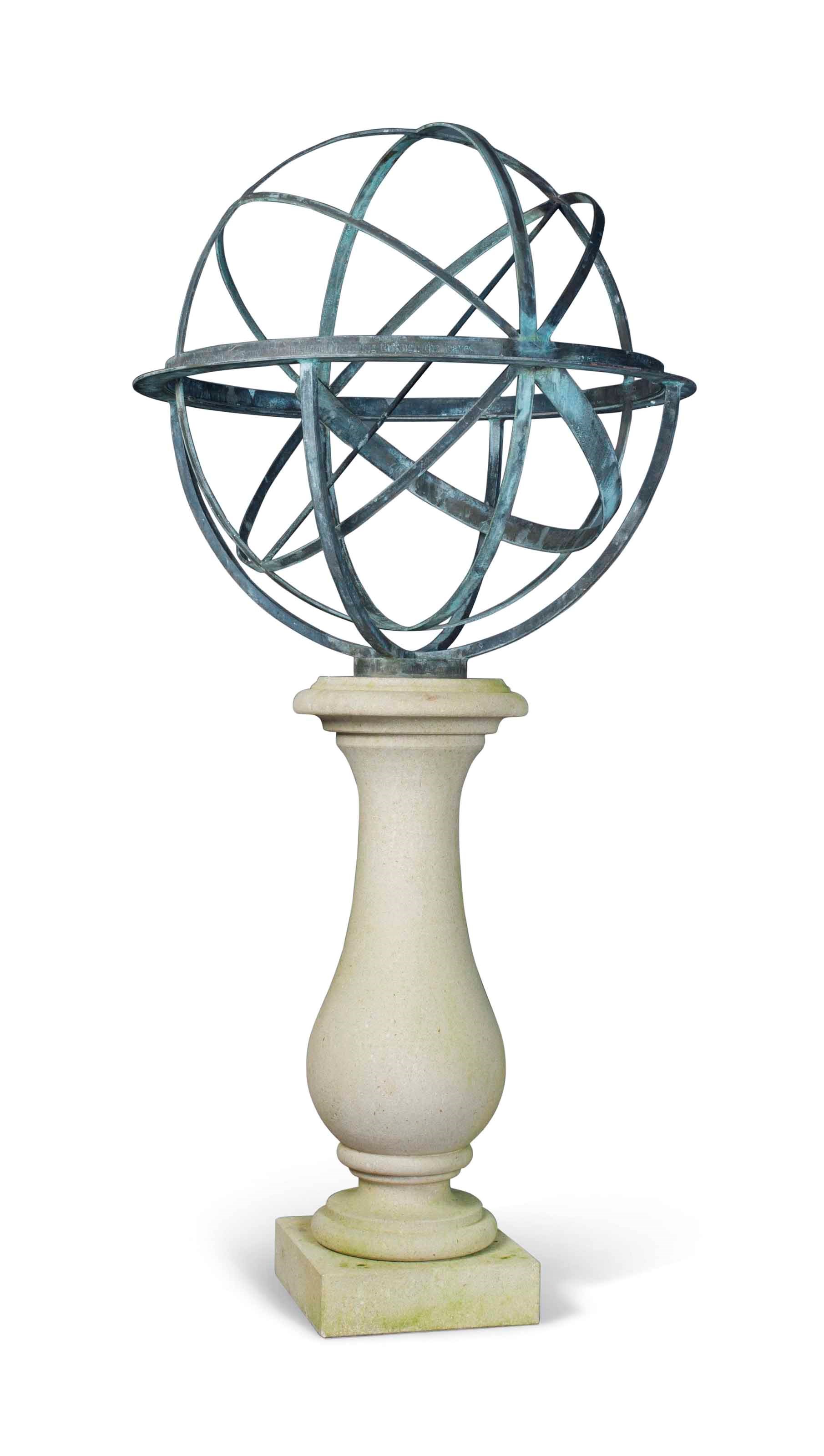 A BRONZE ARMILLARY SPHERE ON A STONE SUNDIAL BASE