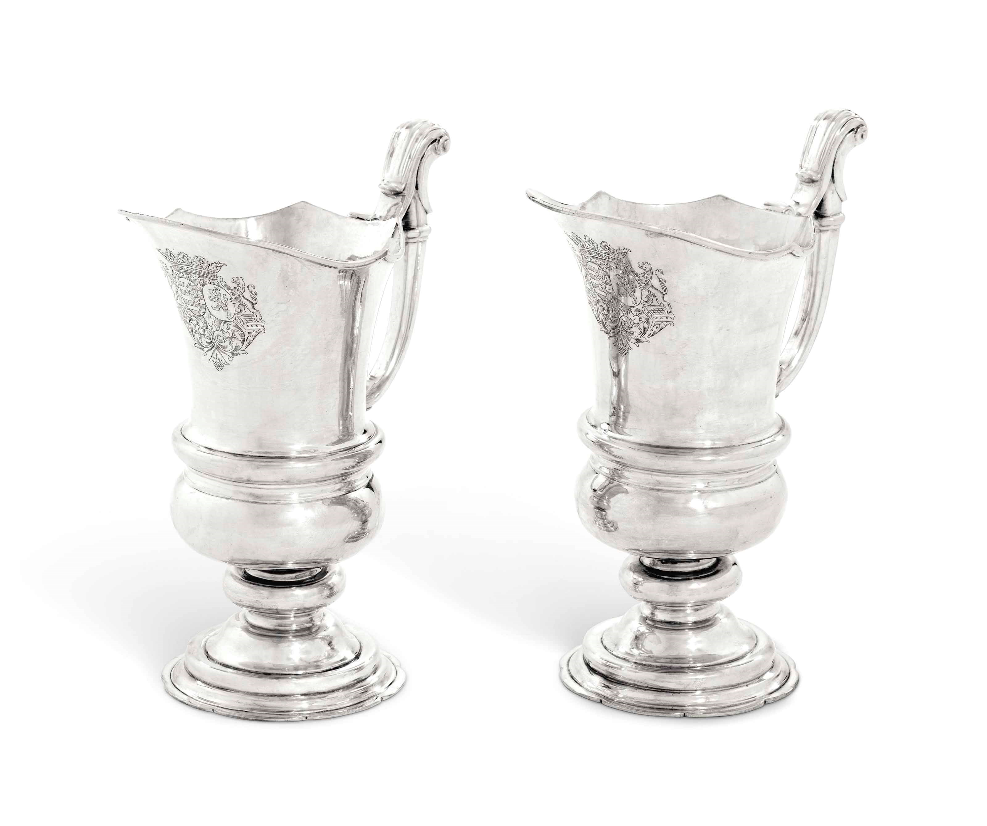 A PAIR OF GERMAN SILVER EWERS