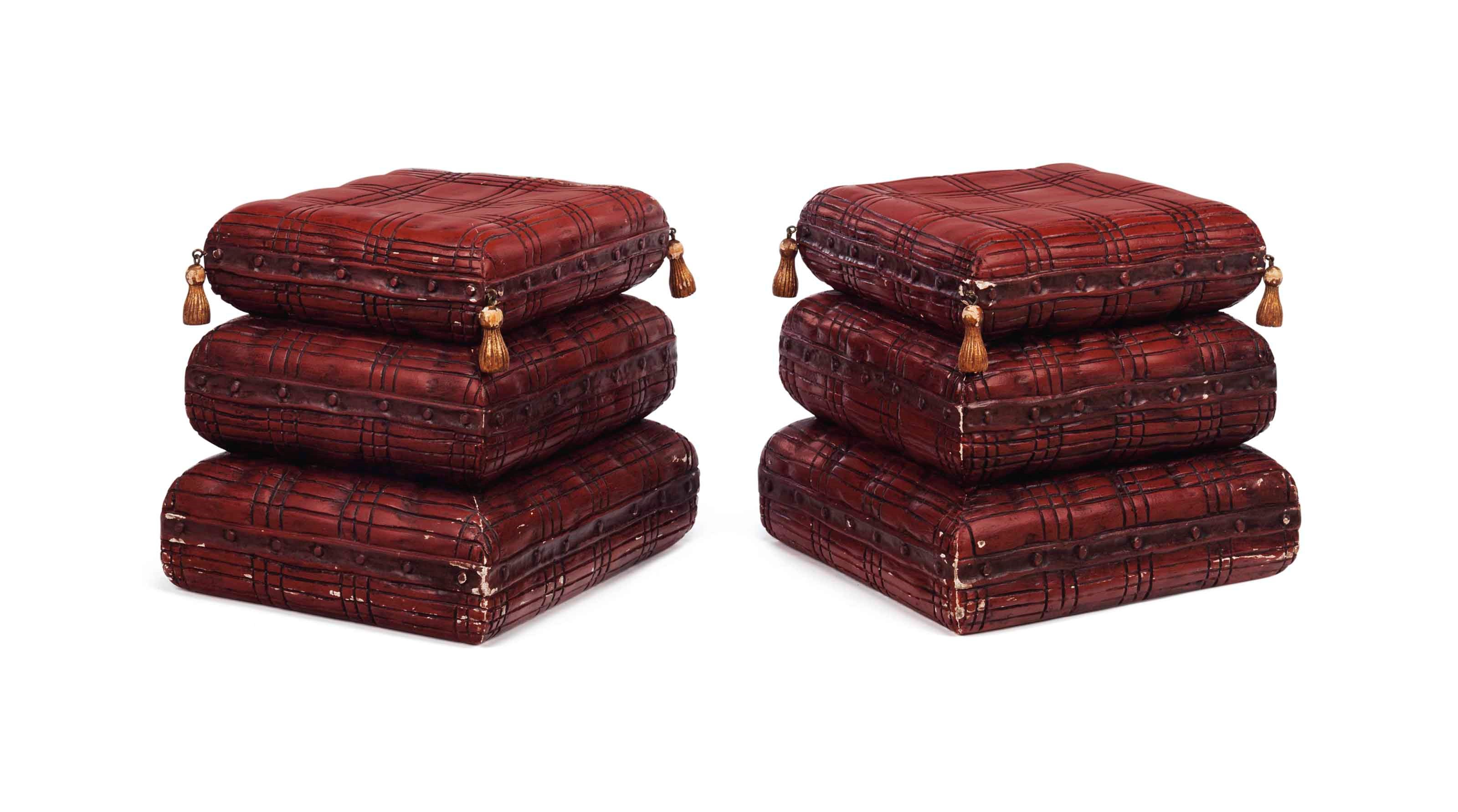 A PAIR OF NORTH EUROPEAN RED-PAINTED AND PARCEL-GILT TRIPLE CUSHION-FORM STOOLS